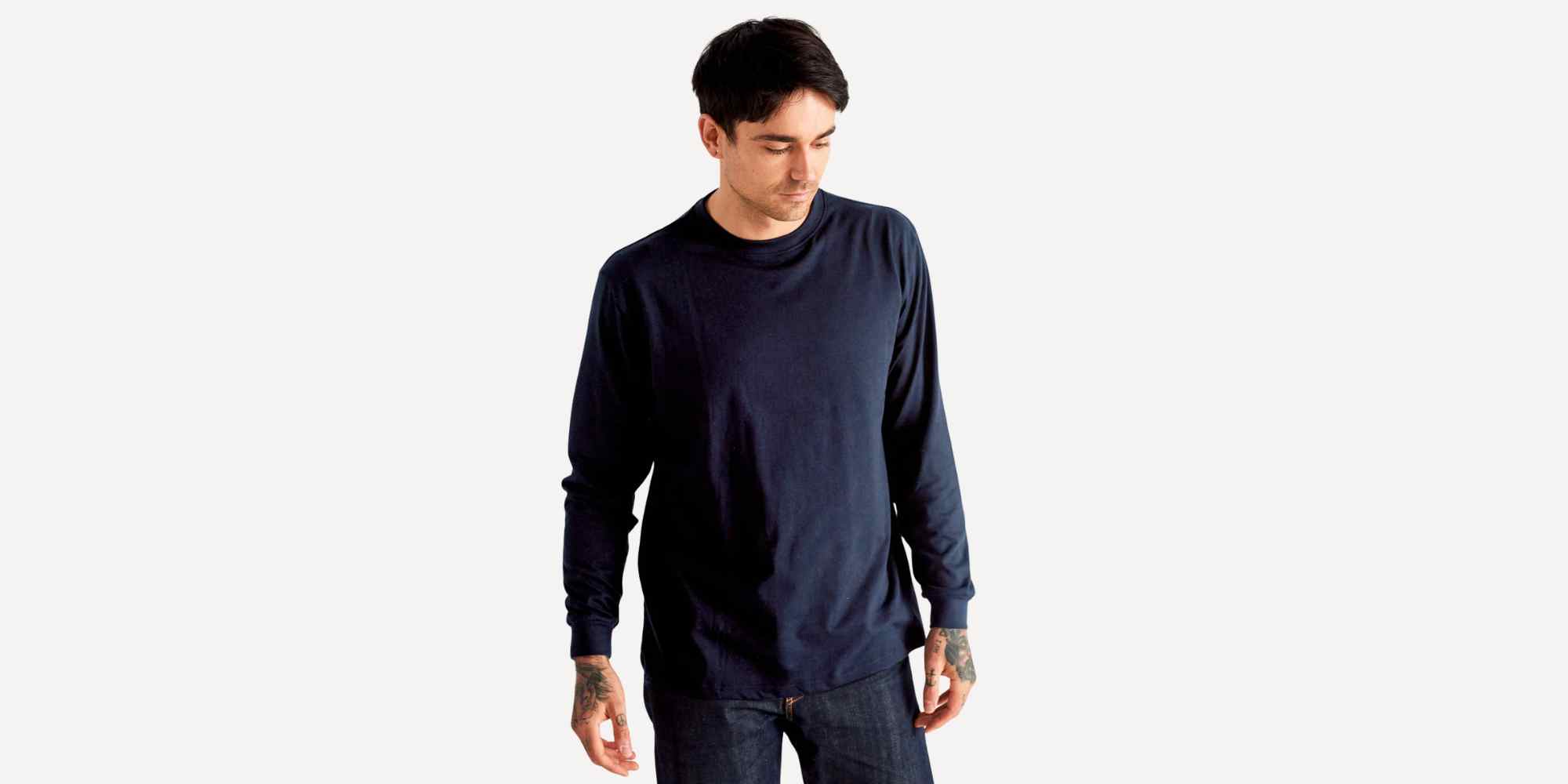 person wearing t-shirt from the common good company