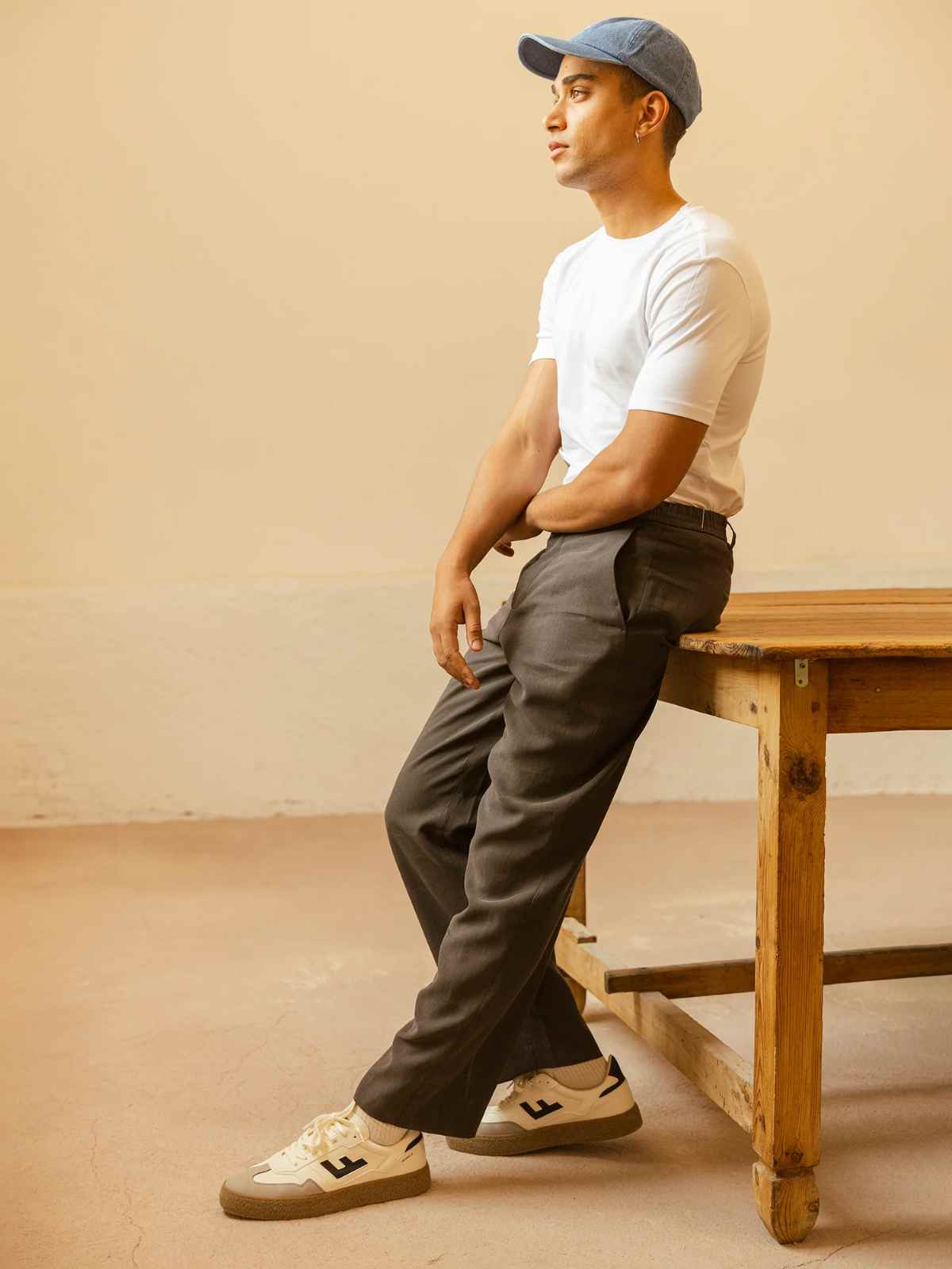 Person wearing white Flamingos Life sneakers