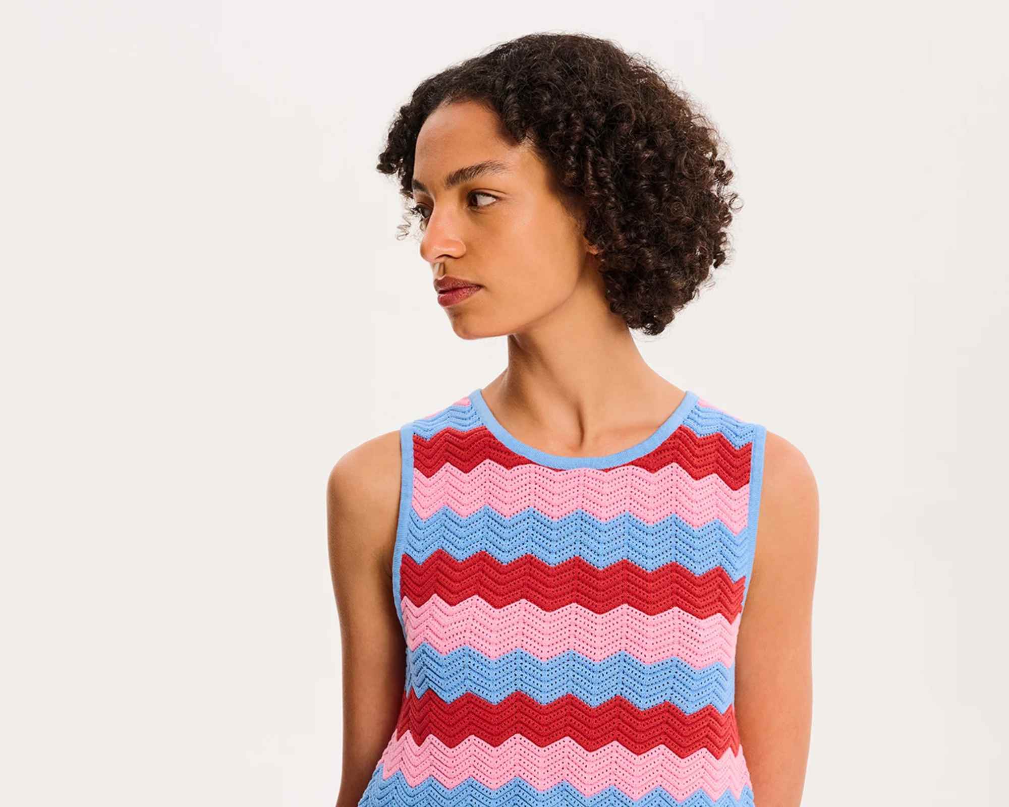 person wearing colourful outfit from omnes