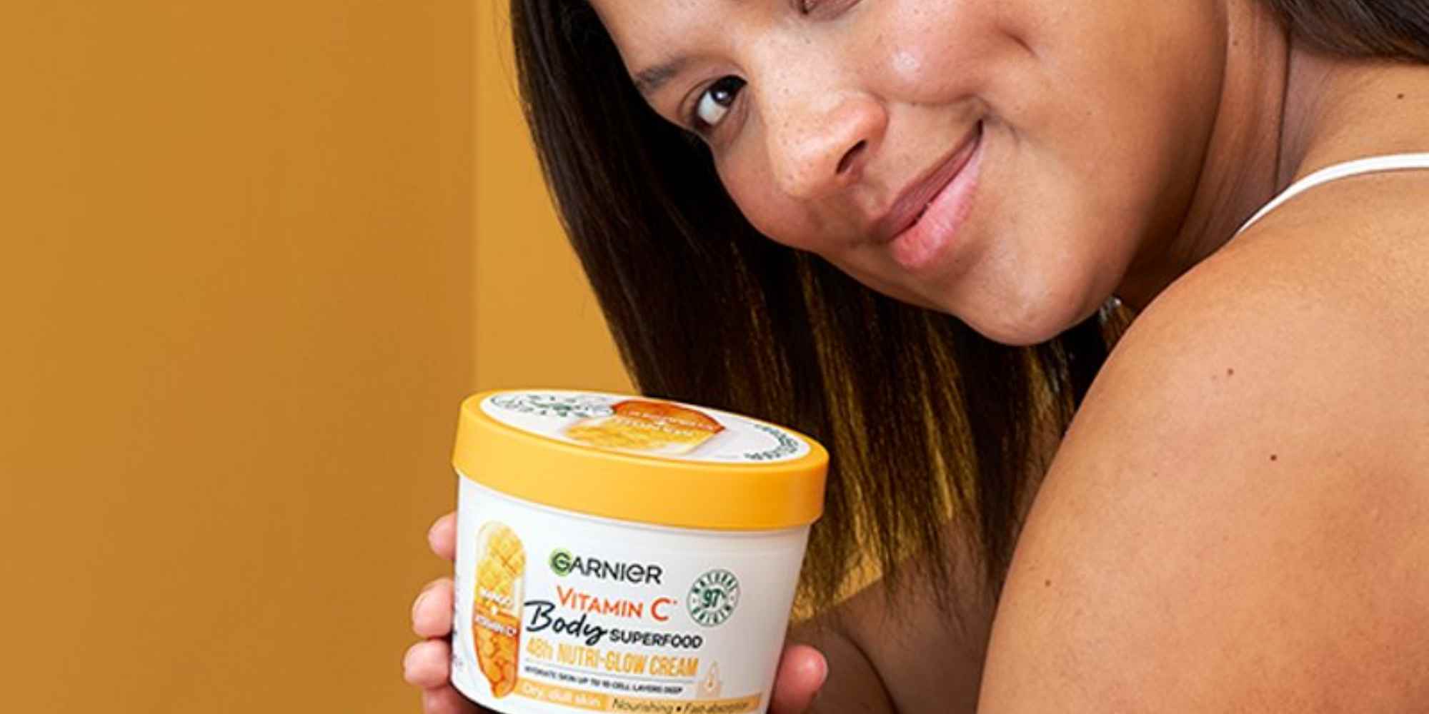 person holding product from garnier