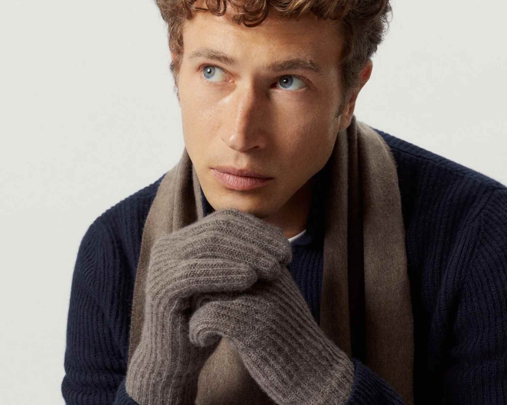 person wearing more sustainable mens winter clothes from artknit studios