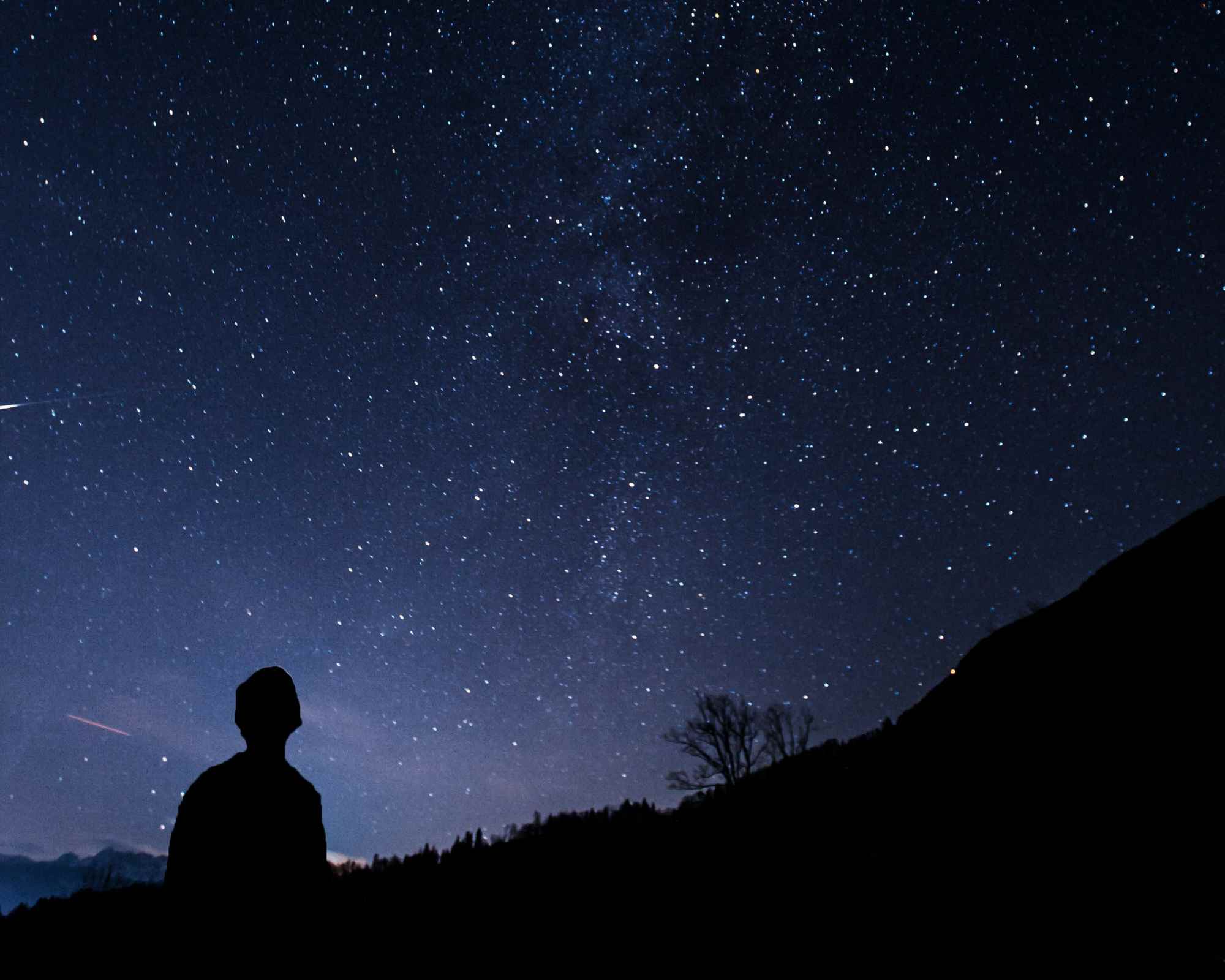 person looking up into the stars