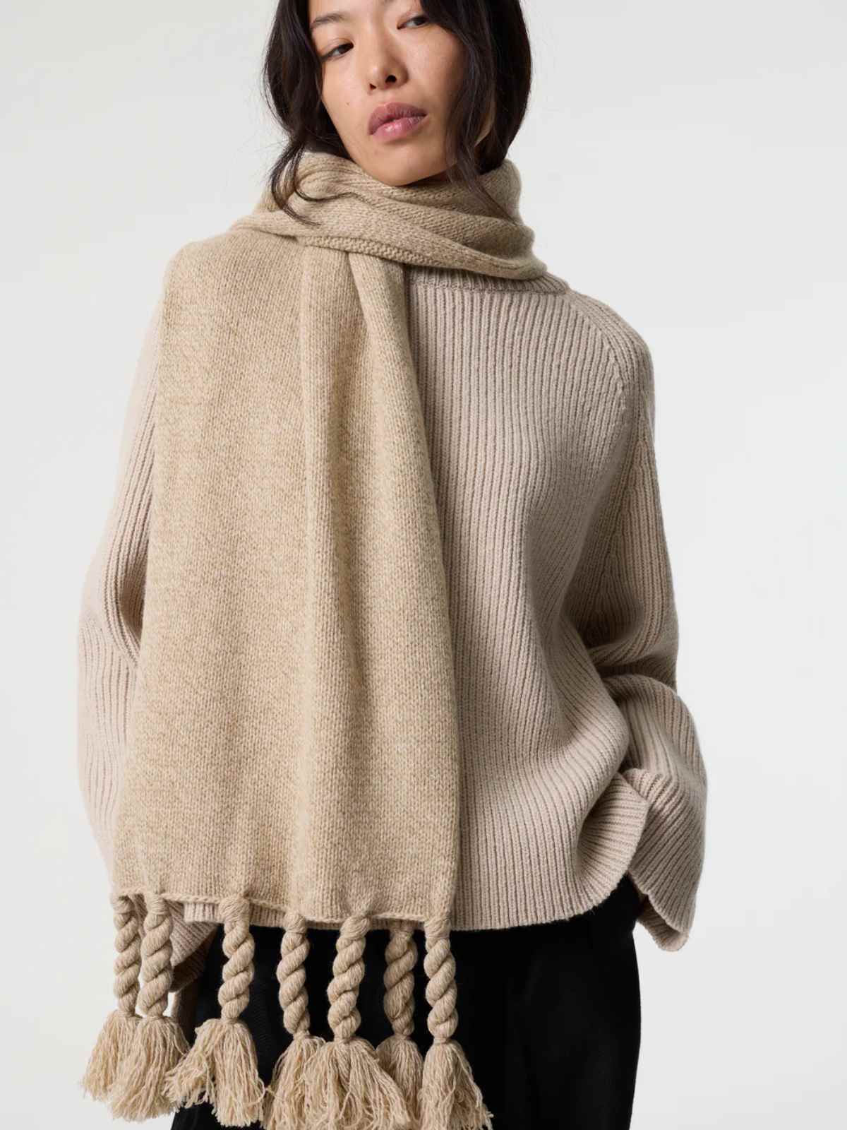 person wearing more sustainable scarf from akyn