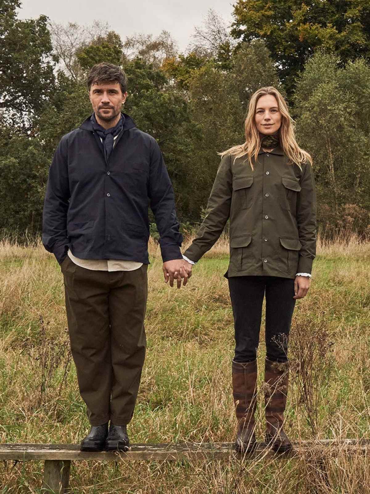 people standing in a field wearing neem clothing