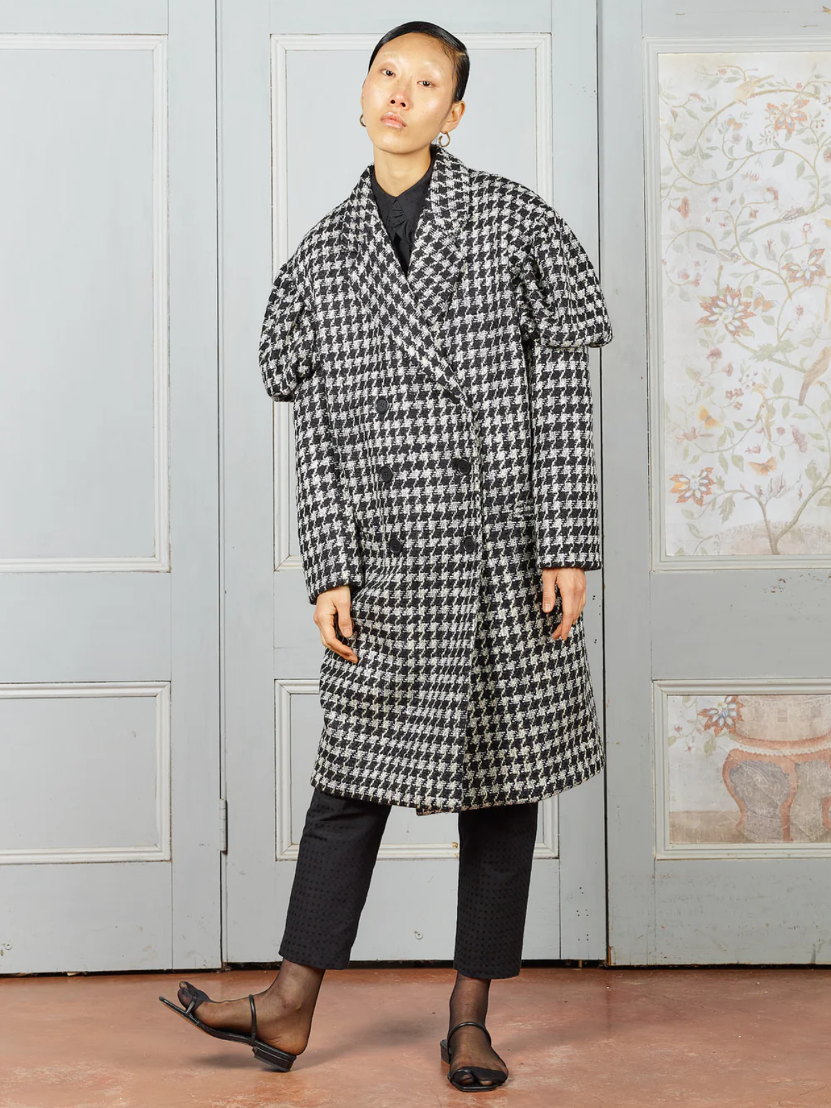 person wearing checked coat from kalaurie