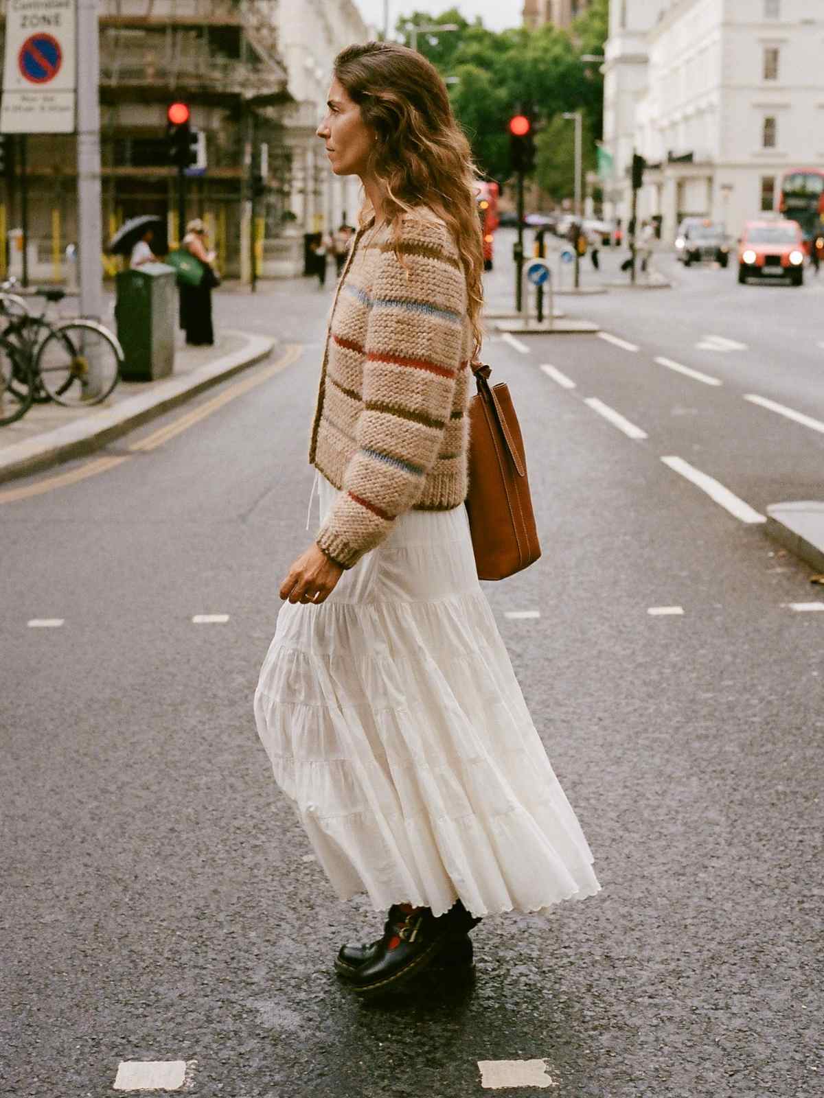 person wearing more ethical wool cardigan from christy dawn