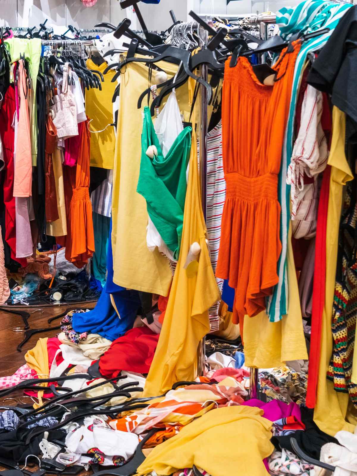 piles of fast fashion clothes