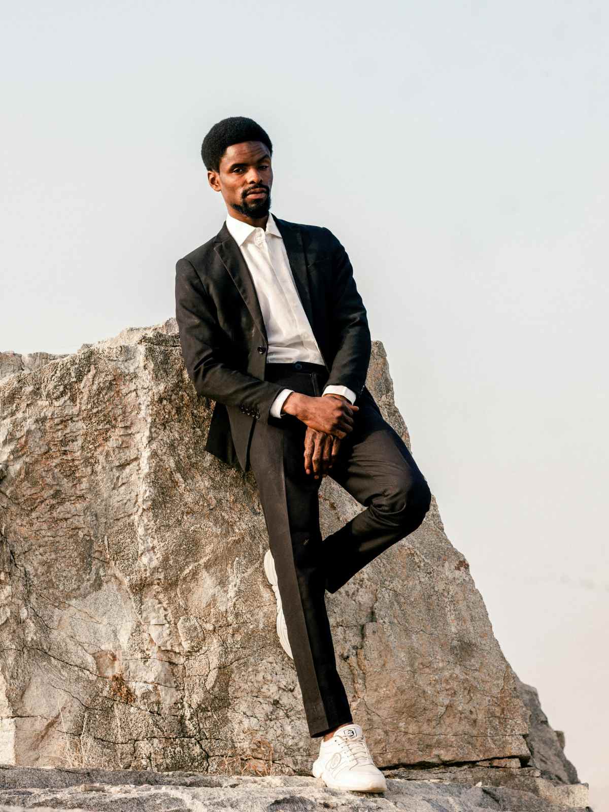 person wearing a black suit