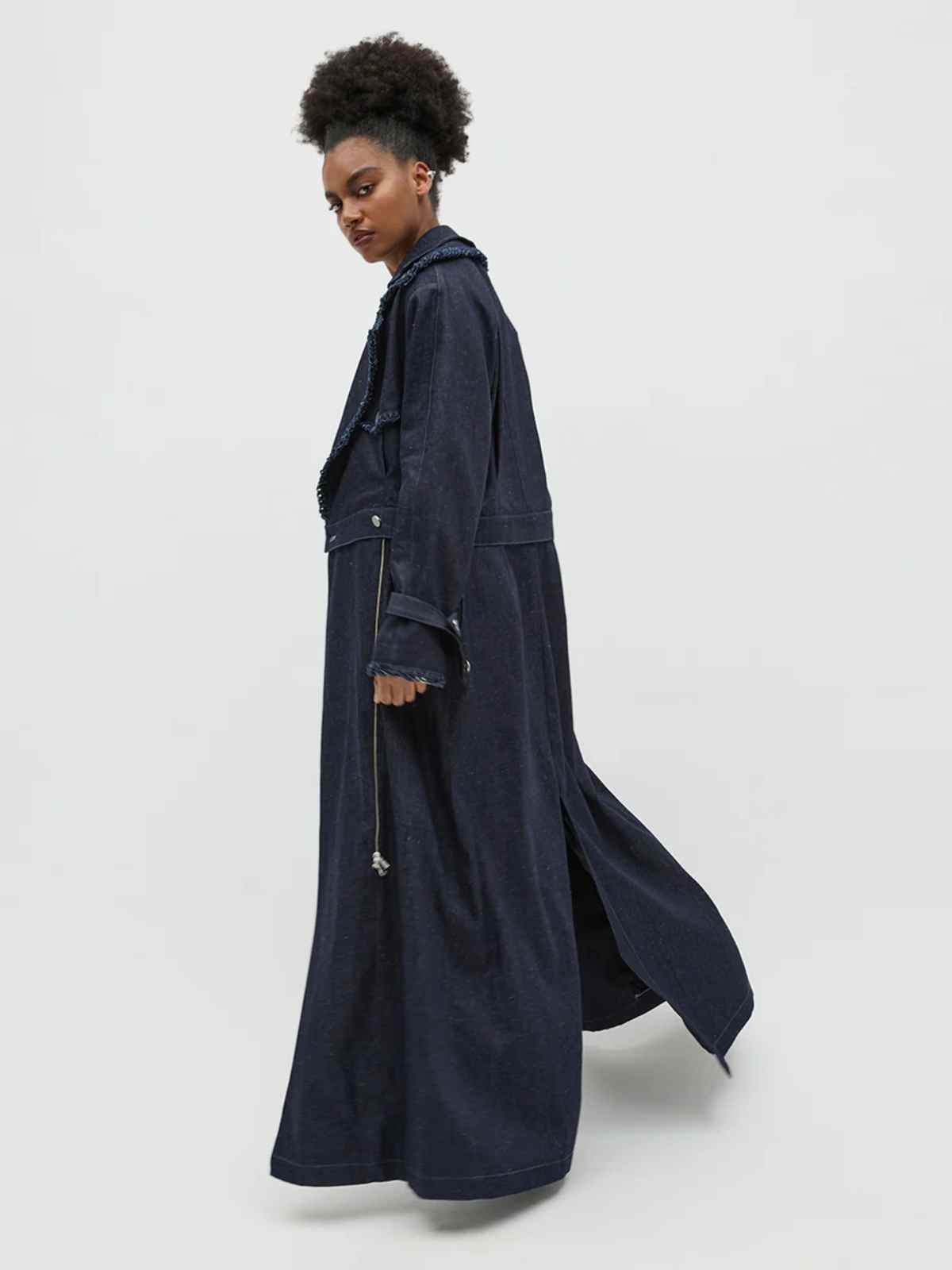 person wearing modest clothing - long coat from bastet noir