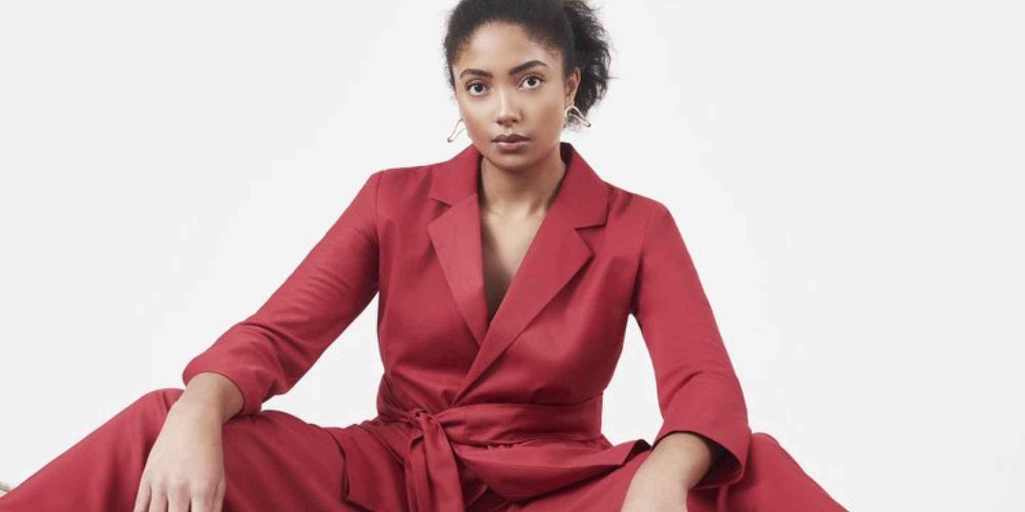 person wearing suit from we are kin