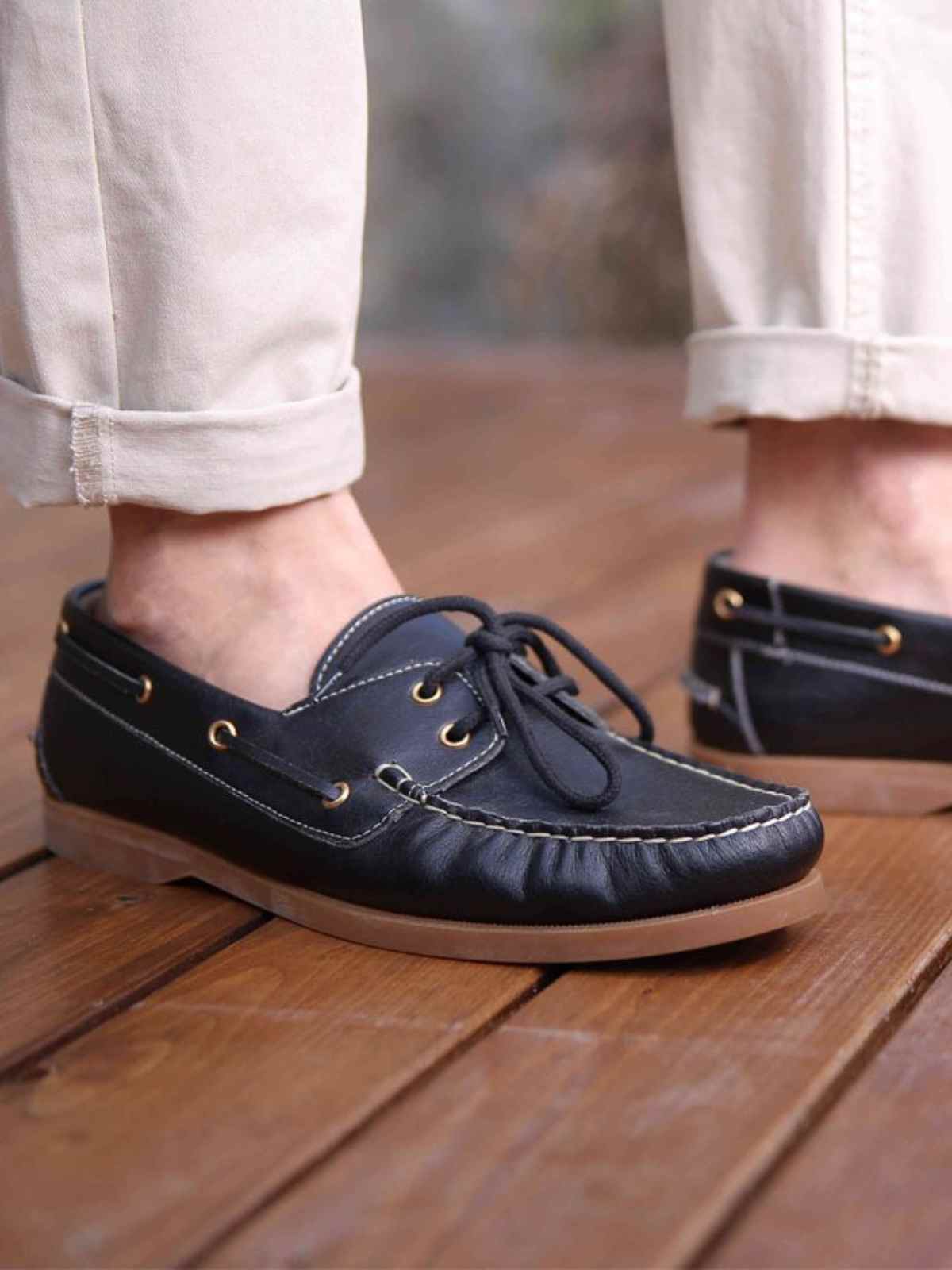 person wearing vegan boat shoes from noah