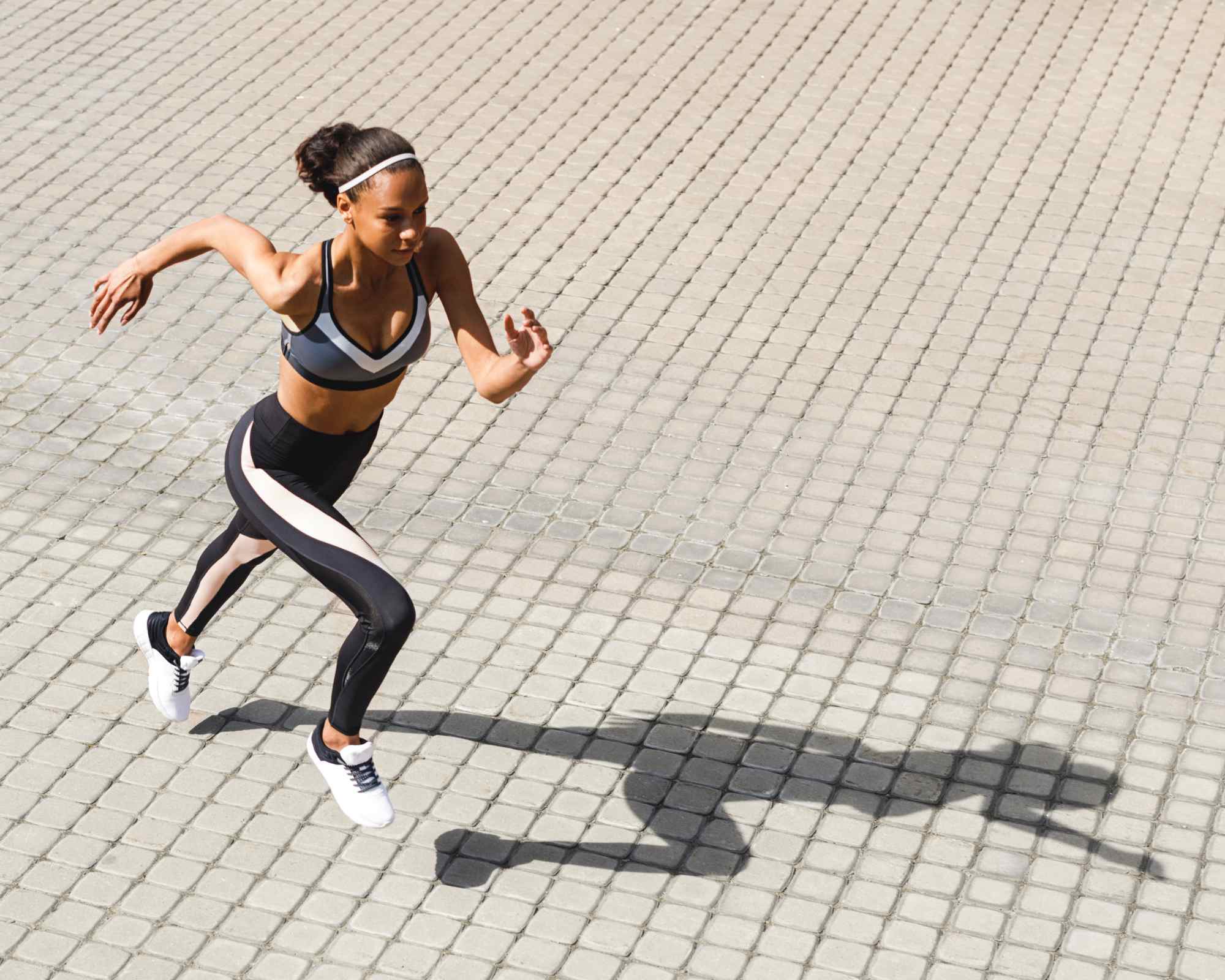 person running in the sun