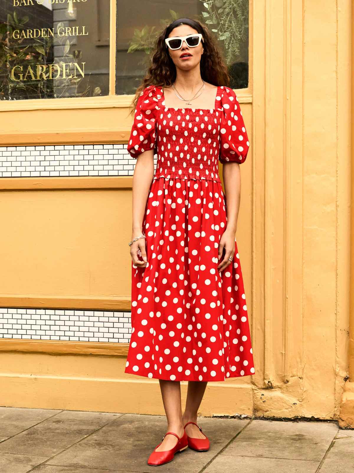 person wearing polka dot dress from baukjen