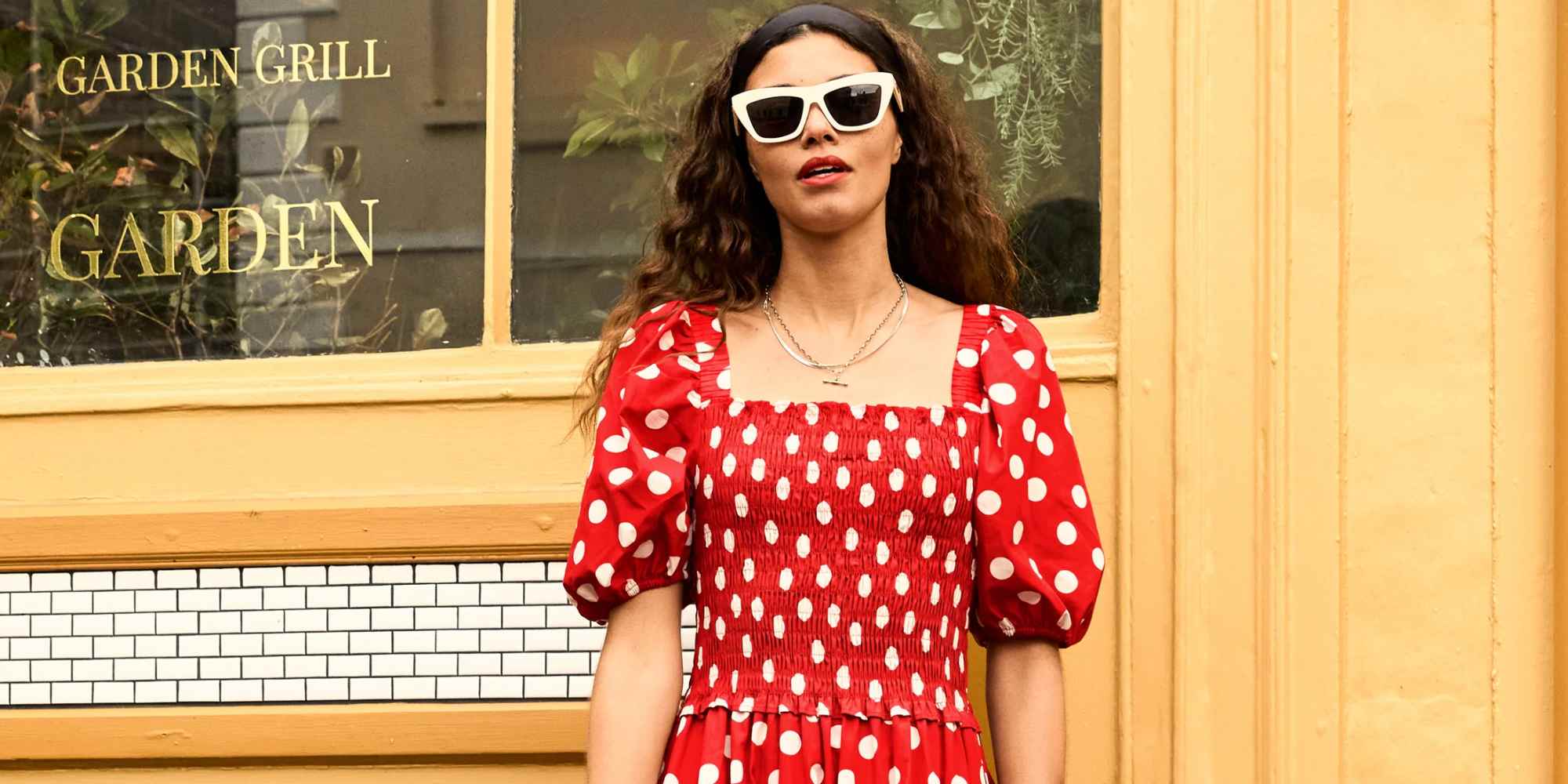 person wearing red polka dot dress from baukjen