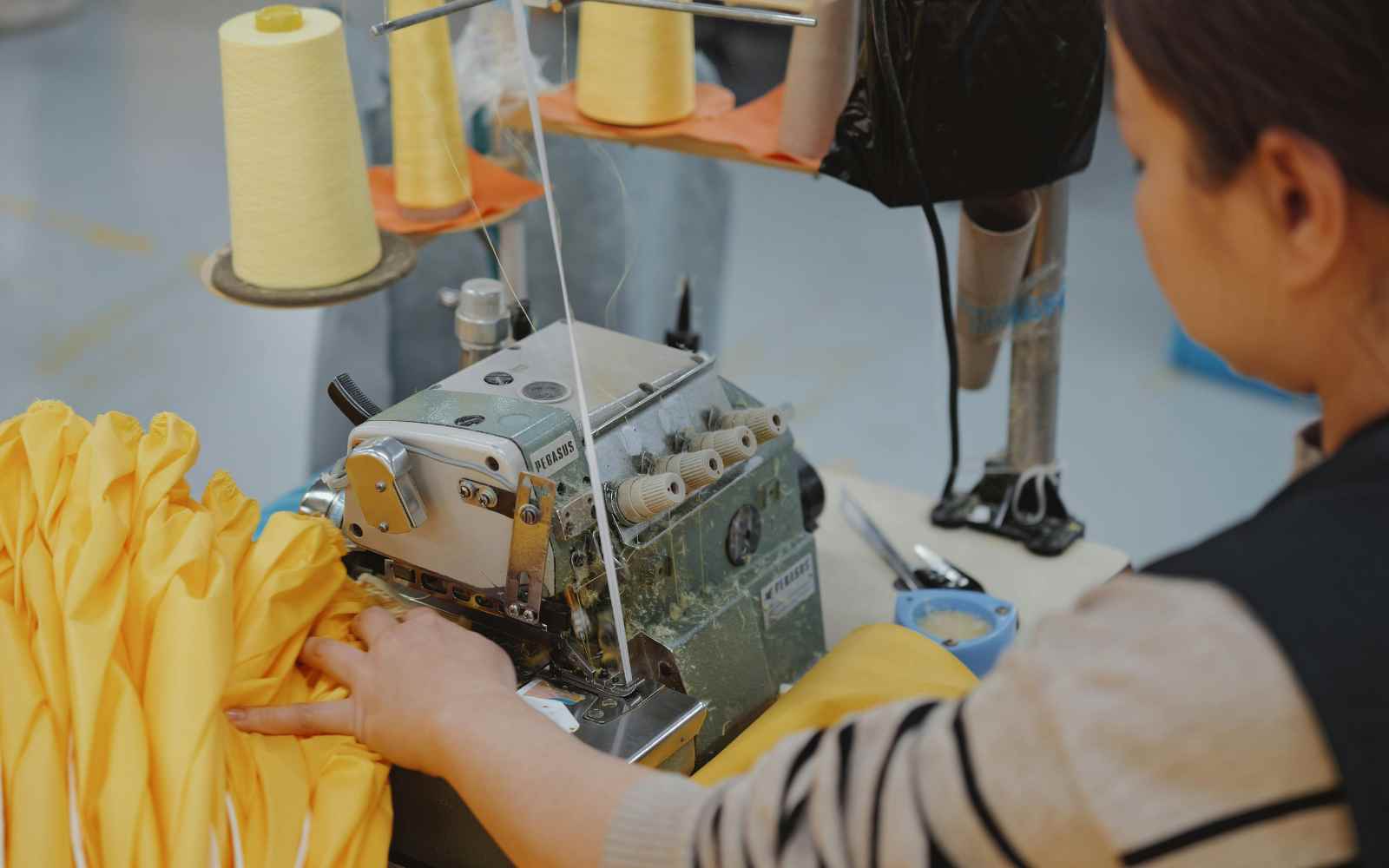 person using an overlocker