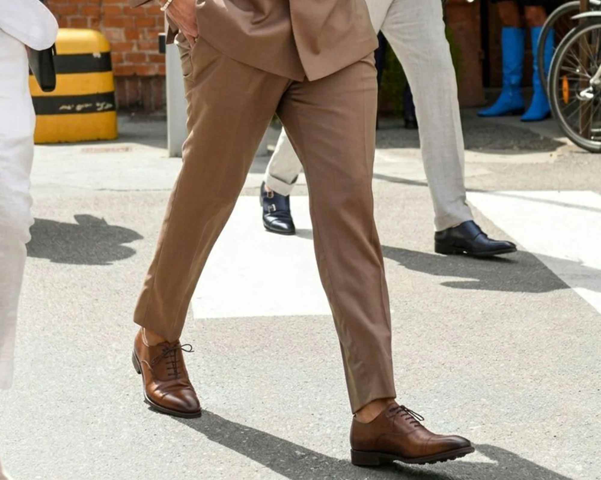 person wearing a suit and vegan shoes from will's vegan store