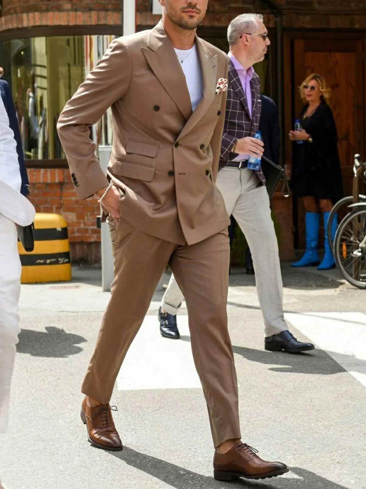 person wearing a suit and vegan shoes from will's vegan store