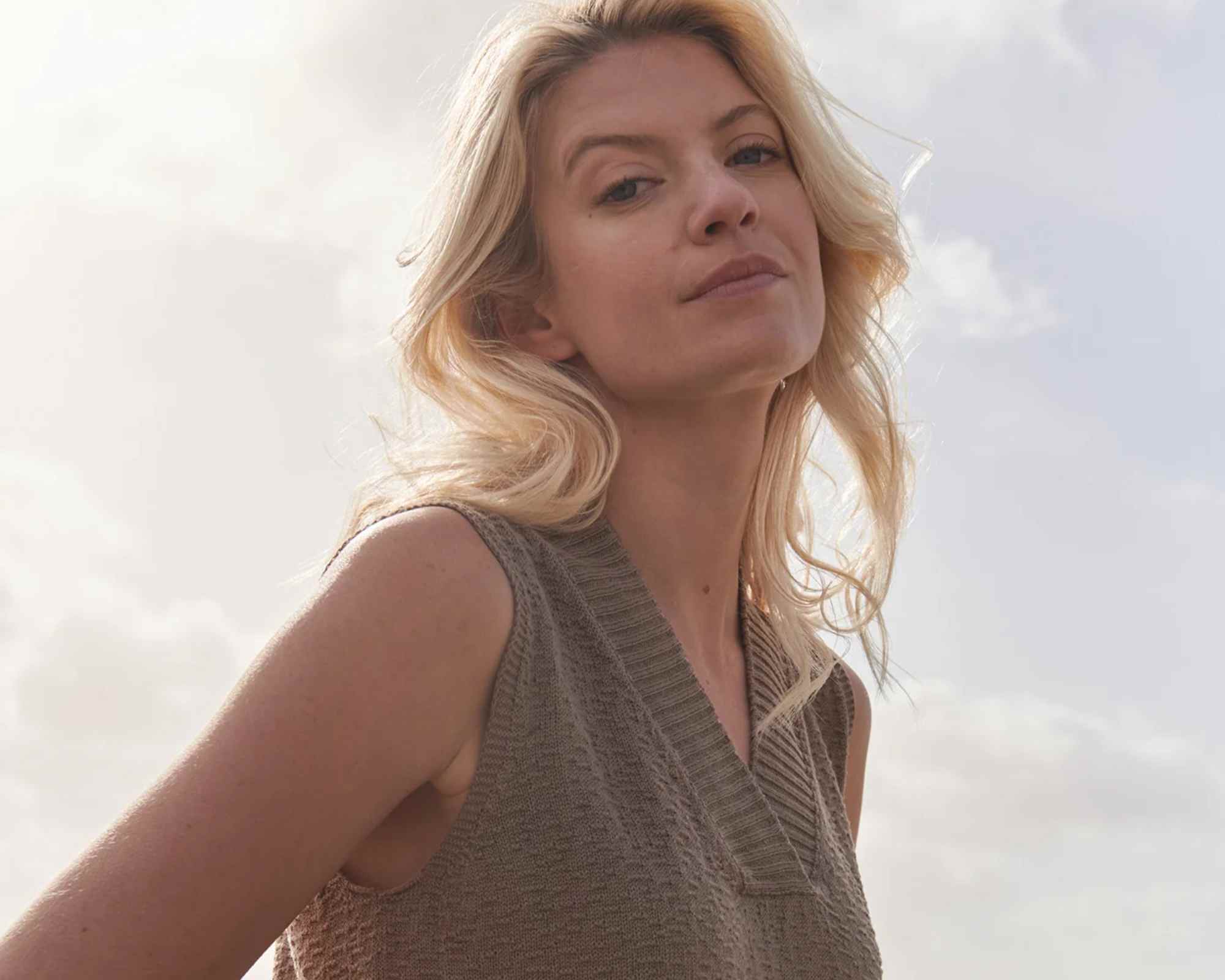 person wearing knit vest top from untouched world