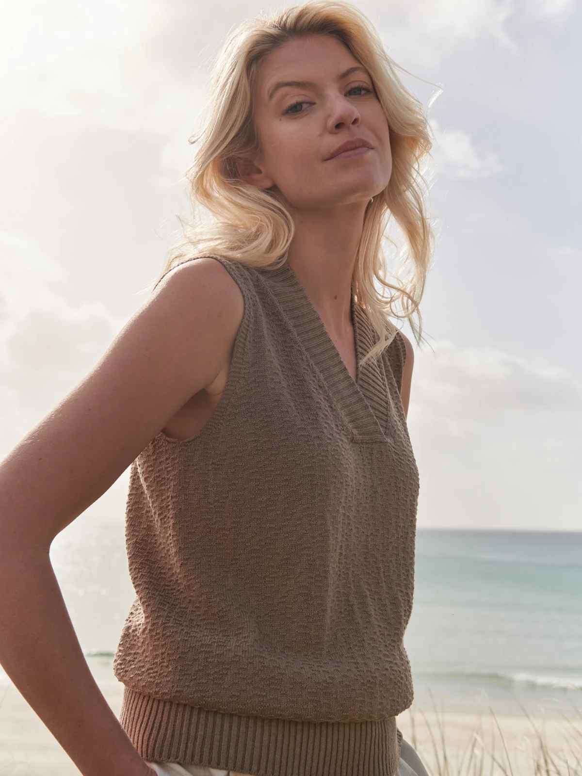 person wearing knit vest top from untouched world