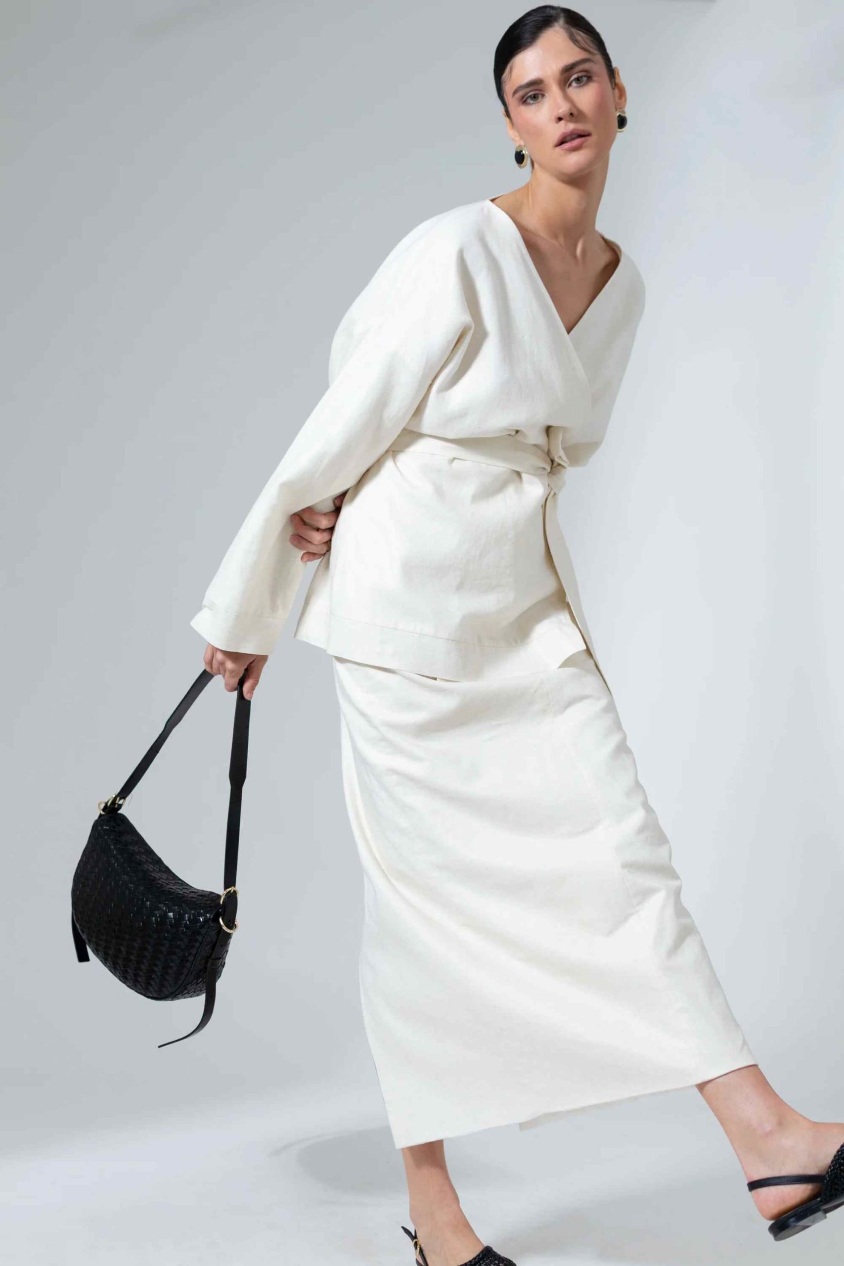 person wearing off-white clothing from bastet noir