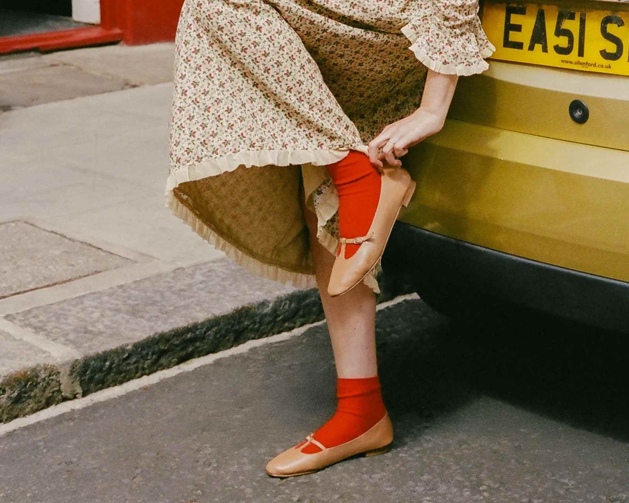 person wearing more sustainable shoes from christy dawn on the street