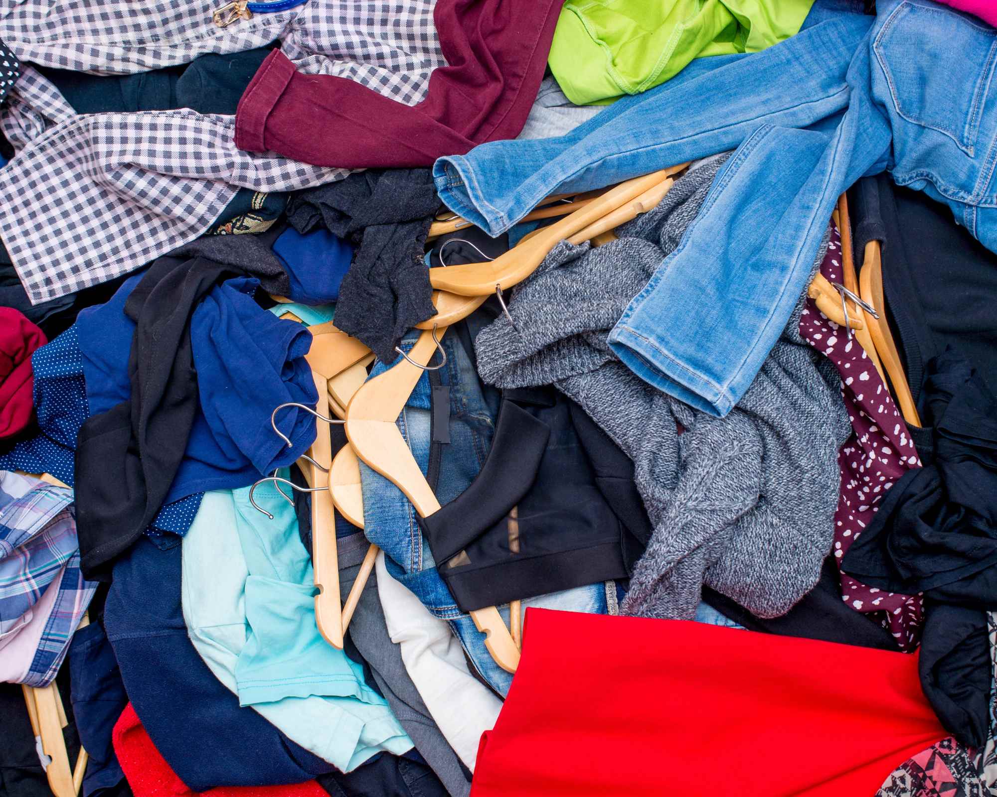 piles of fast fashion clothes