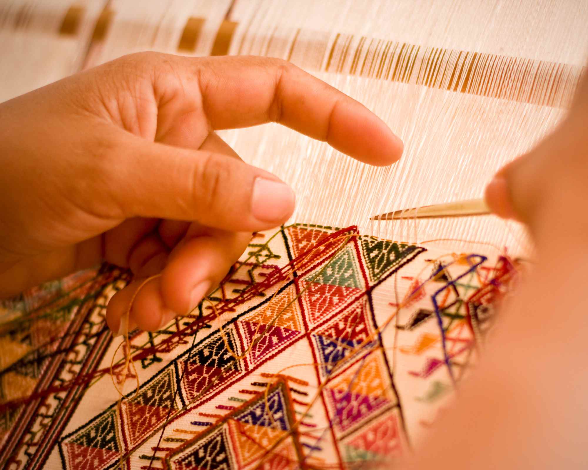 close up of hand weaving craftsmanship