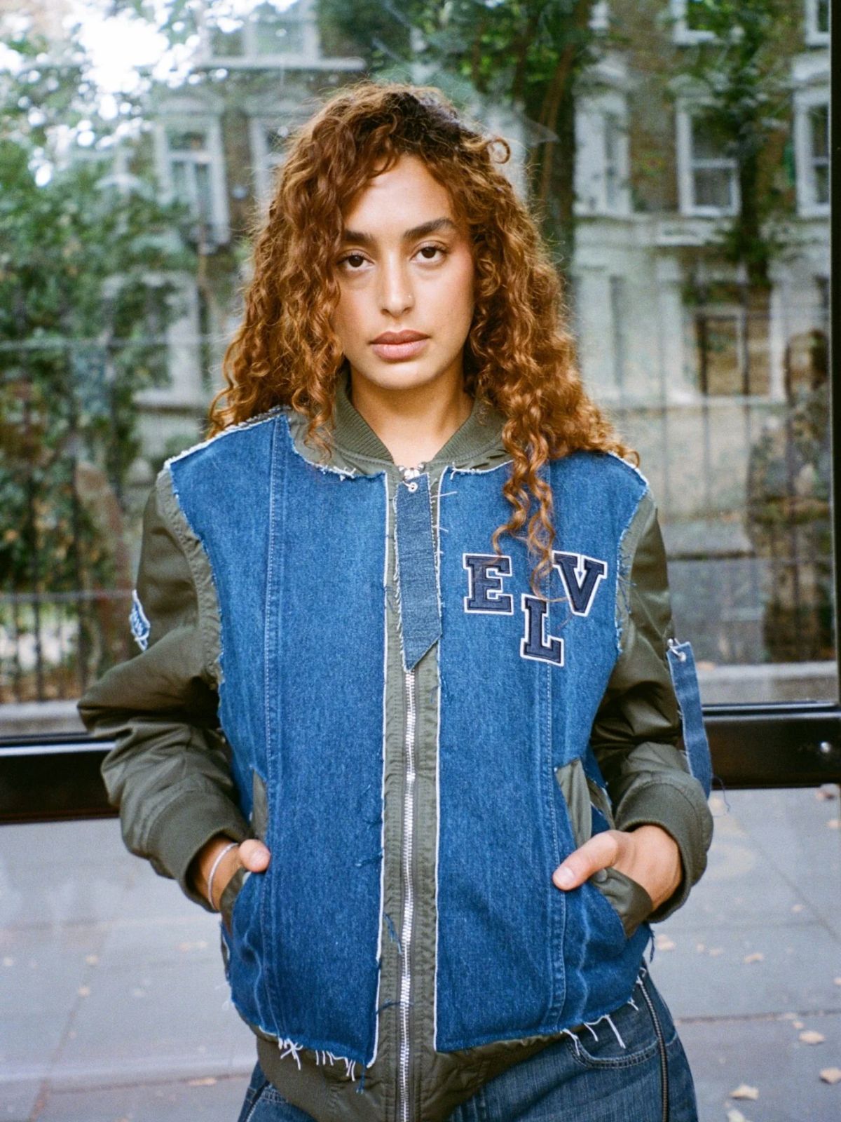 person wearing more sustainable denim jacket from elv denim