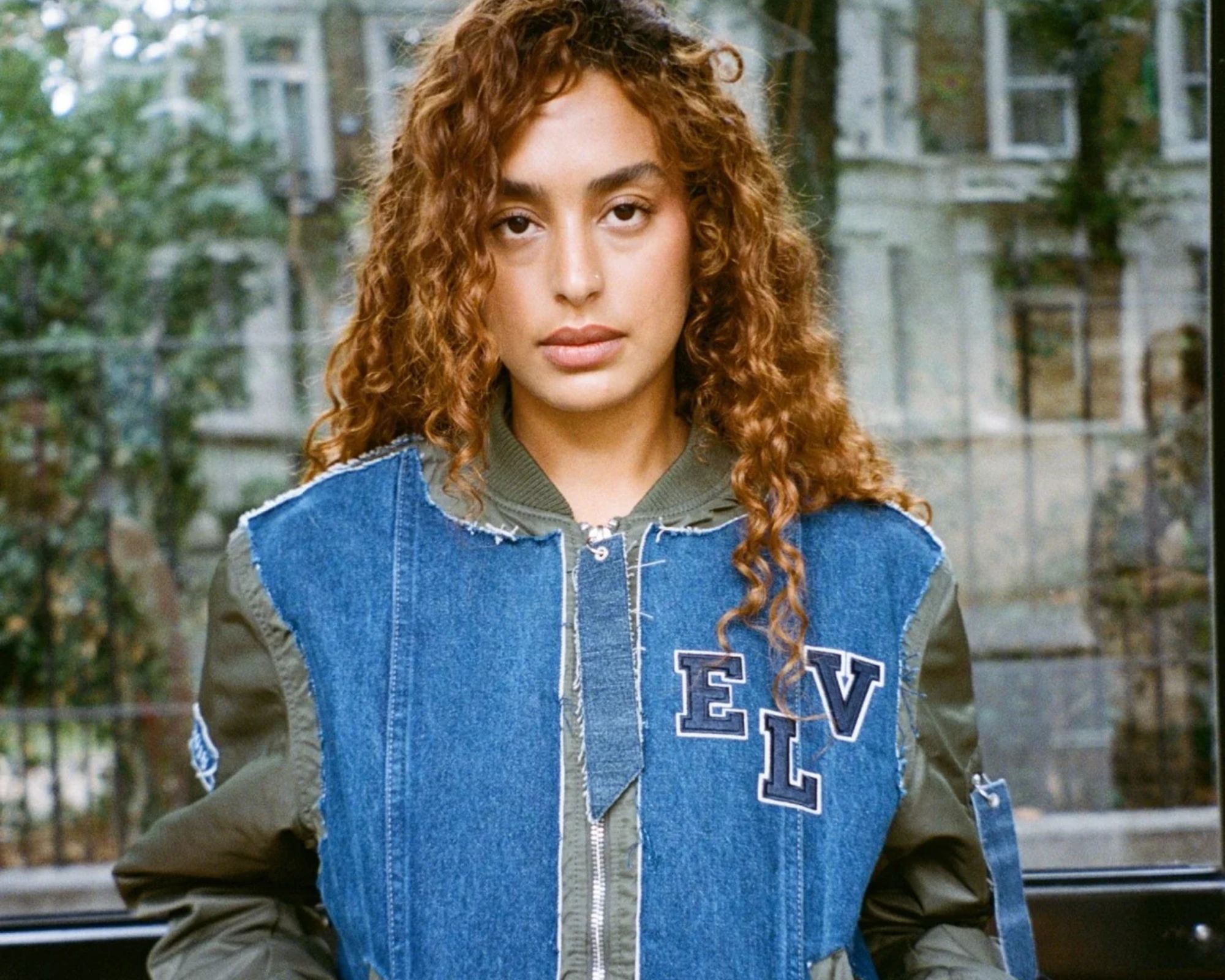 person wearing more sustainable denim jacket from elv denim
