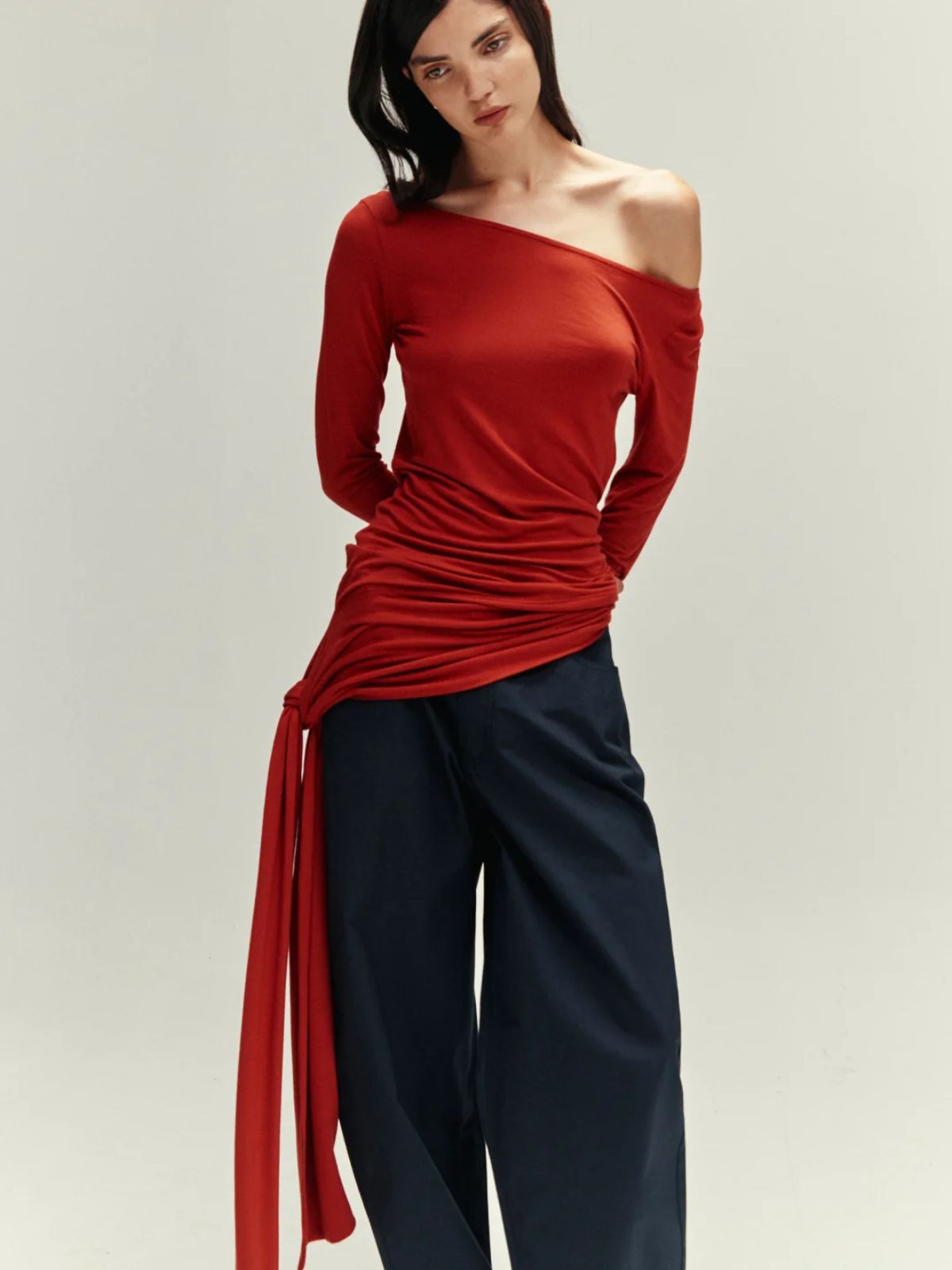 person wearing ruched top alternative to cider from thinking mu