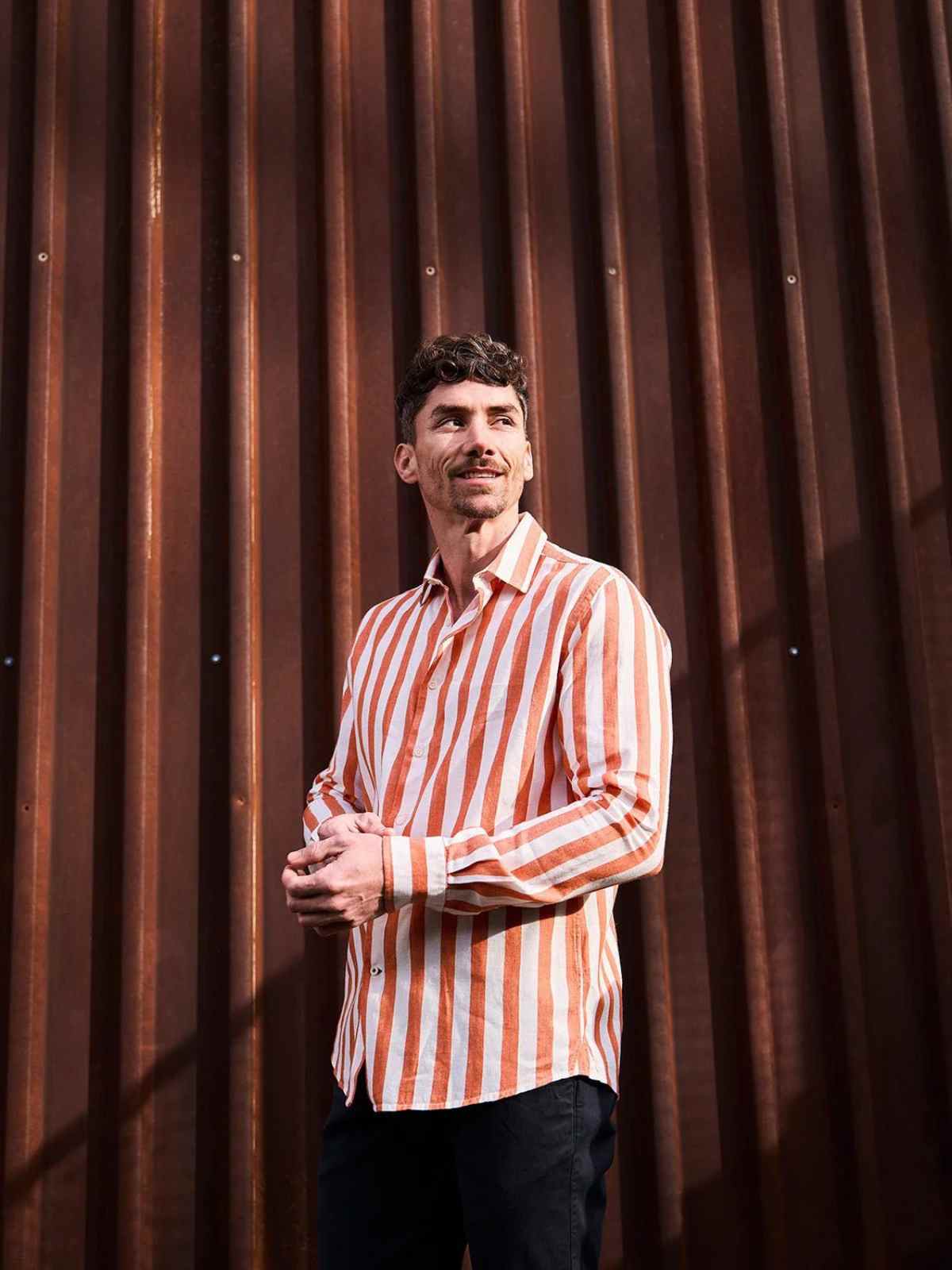 person wearing striped shirt from carpasus