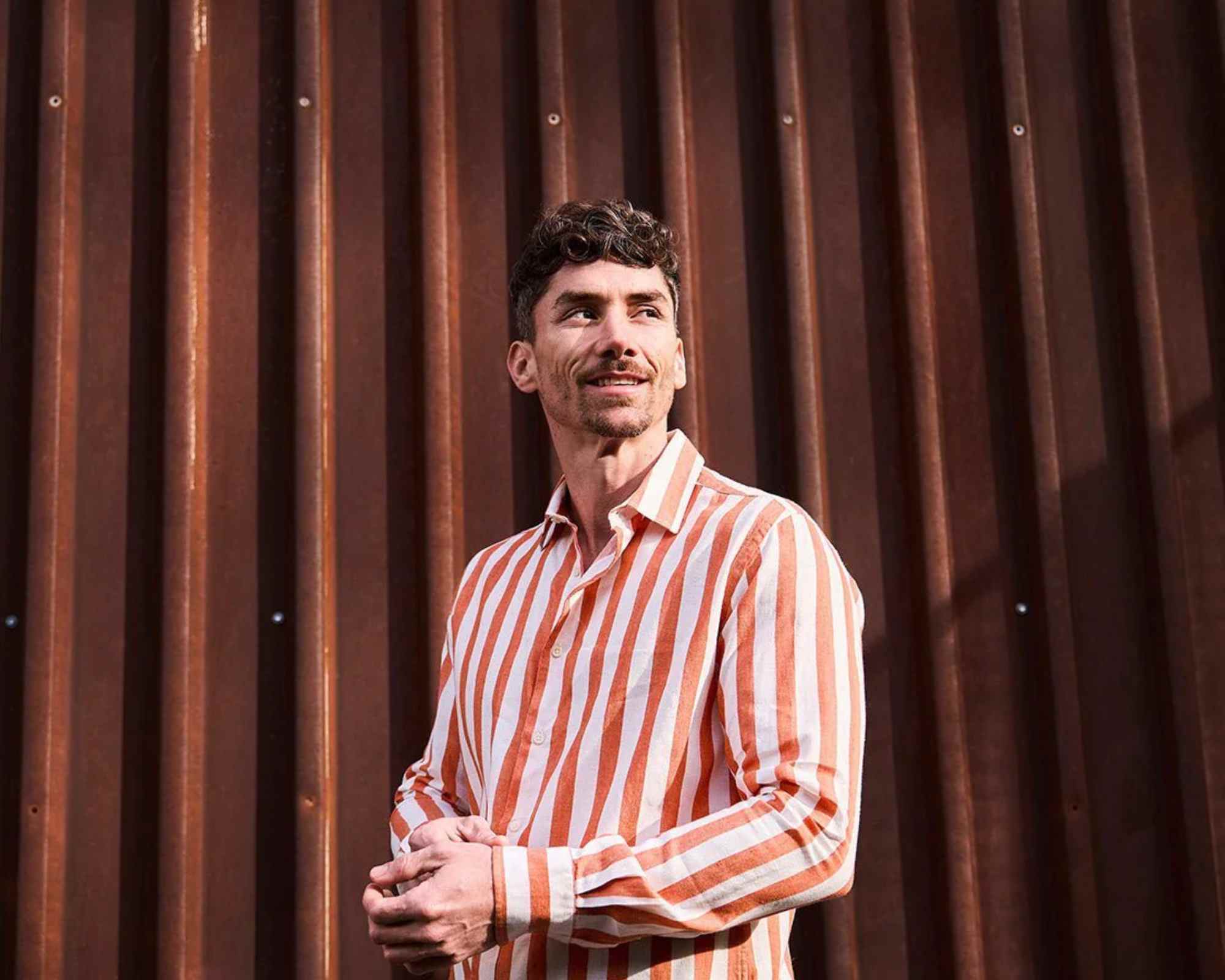 person wearing striped shirt from carpasus