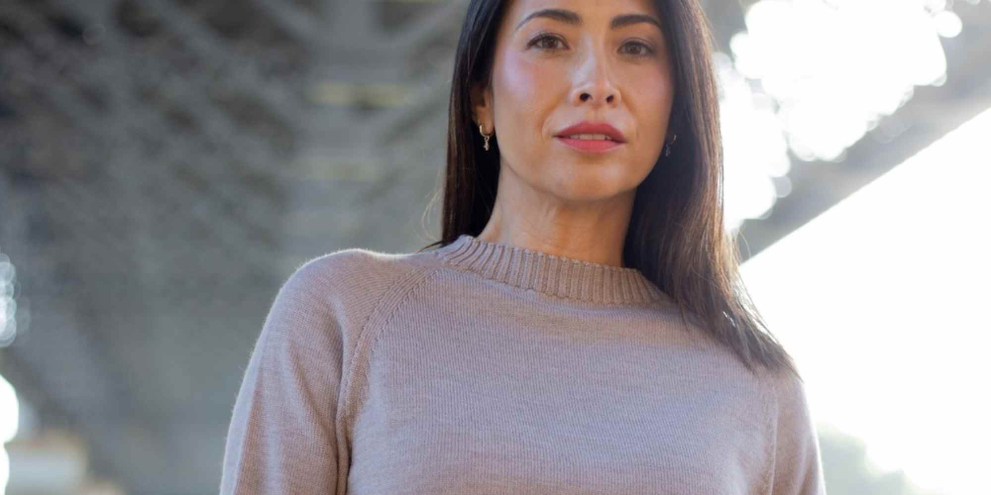 person wearing sweater from citizen wolf