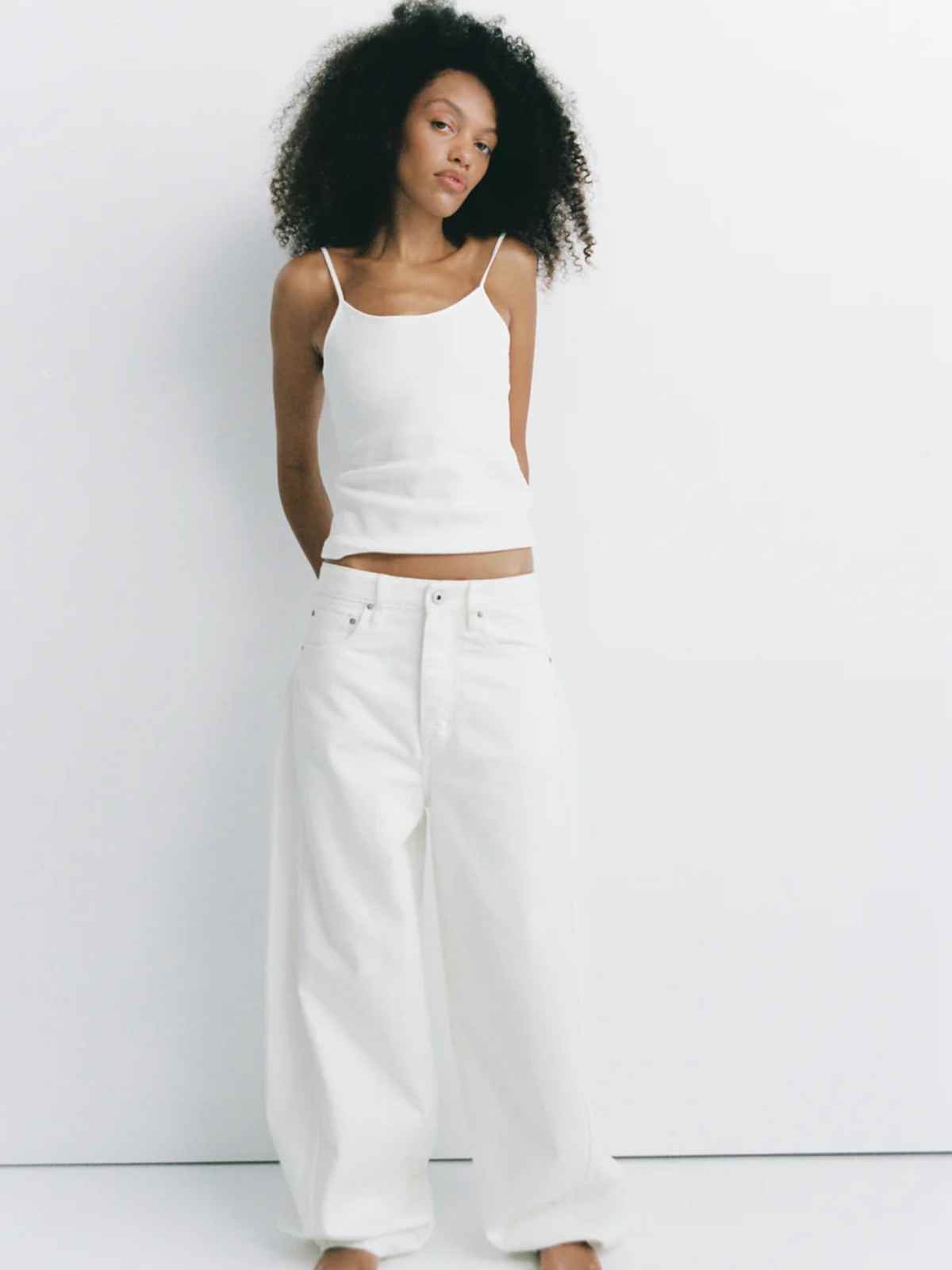 person wearing outfit from more sustainable brand outland denim