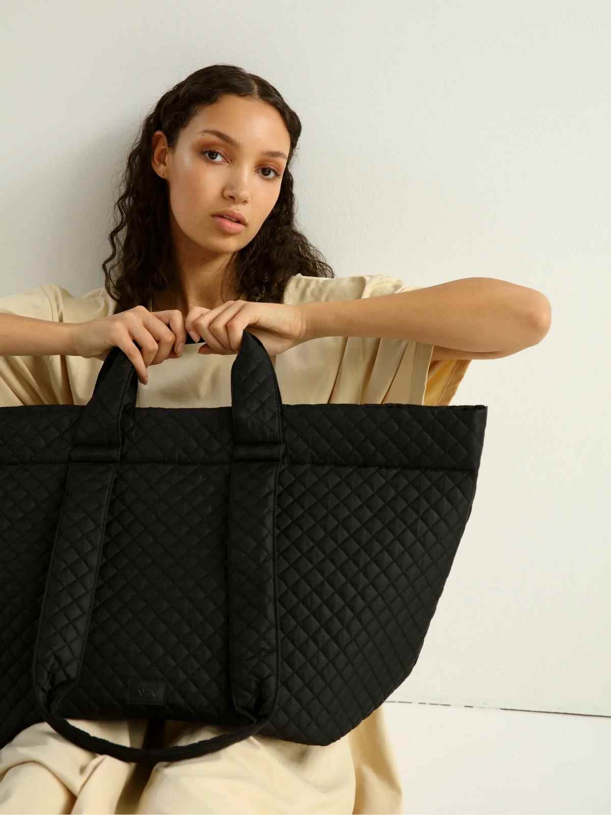 person holding more sustainable tote bag from ask scandinavia