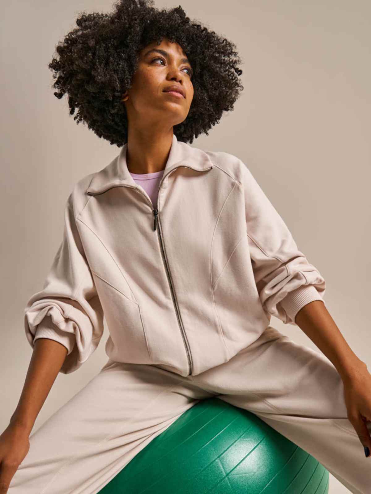 person wearing more sustainable activewear from bam