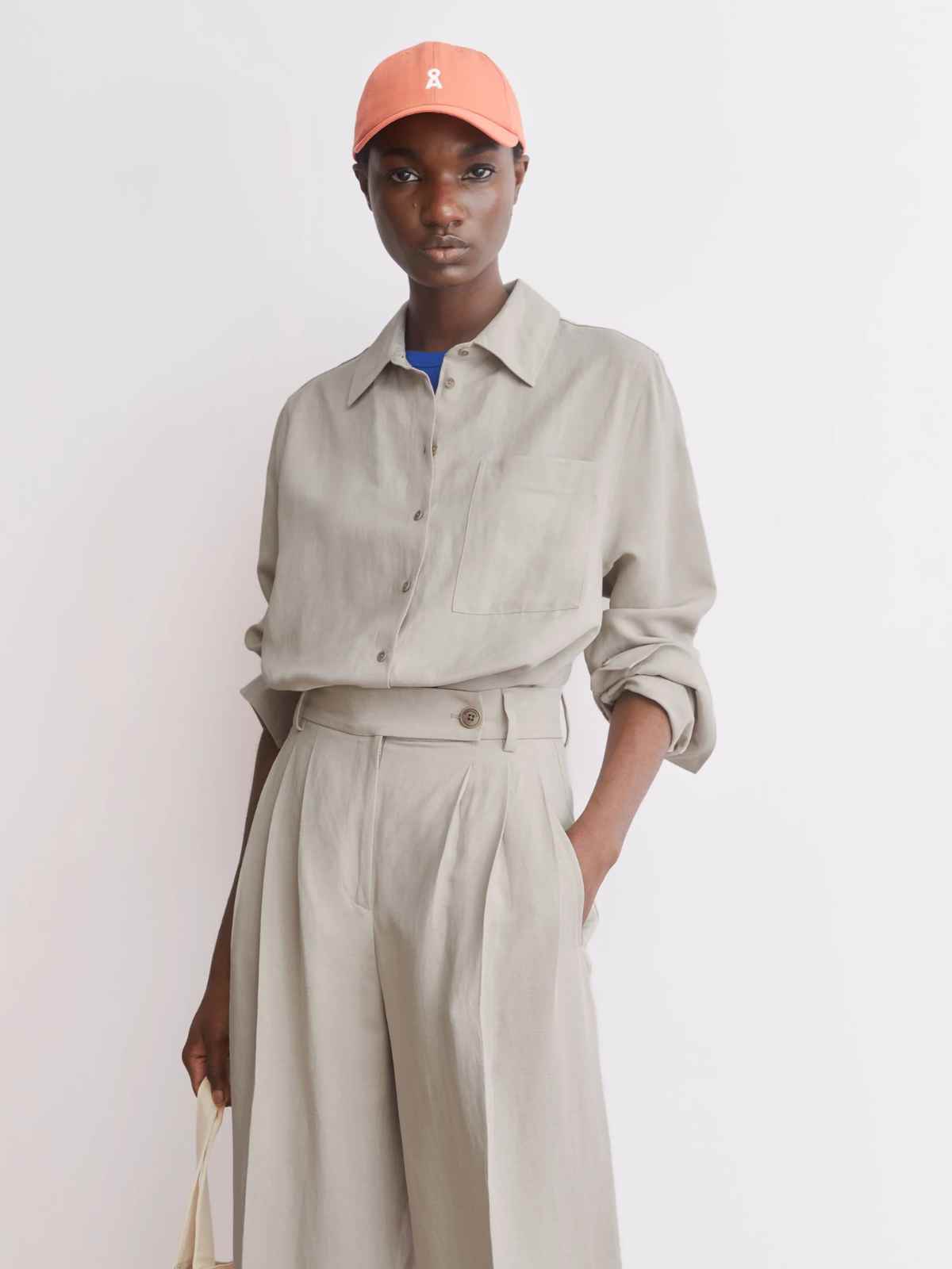 person wearing armedangels outfit alternative to massimo dutti