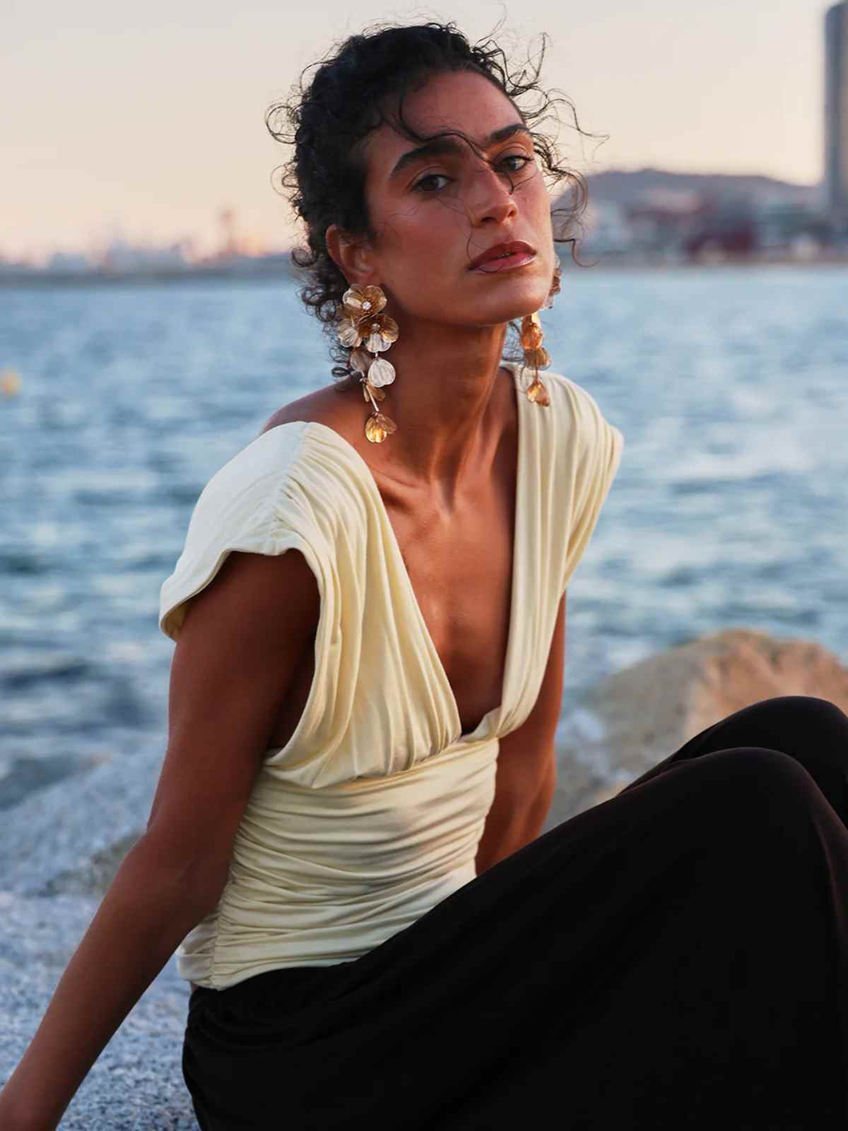 person wearing more sustainable draped top from ninety percent