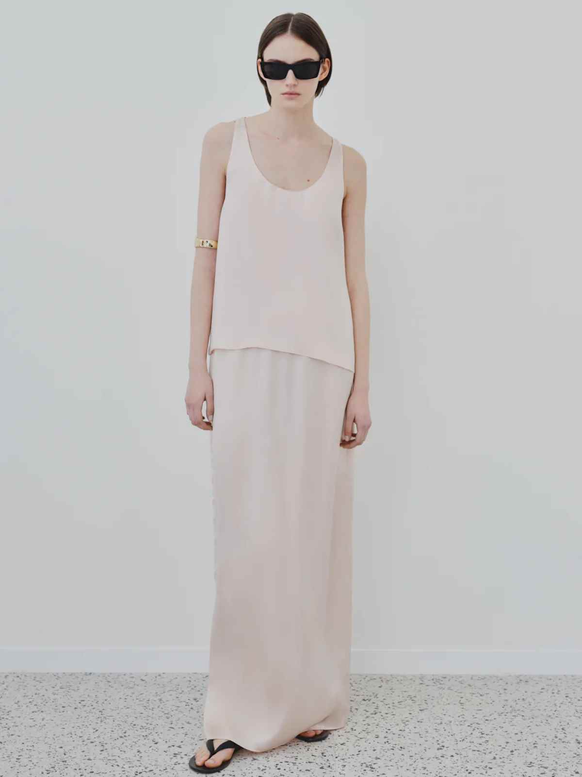 person wearing minimalist outfit by herth