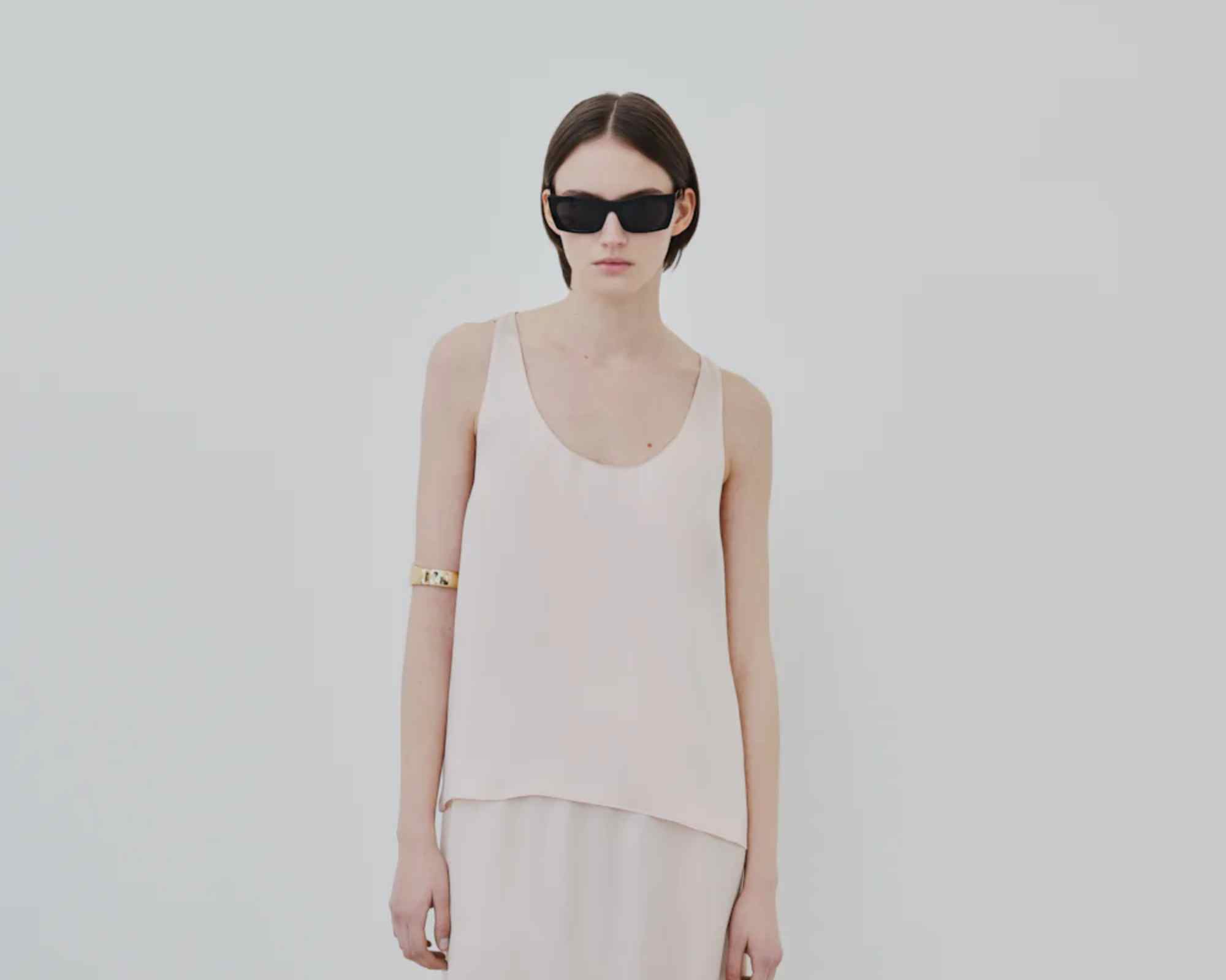 person wearing minimalist outfit by herth