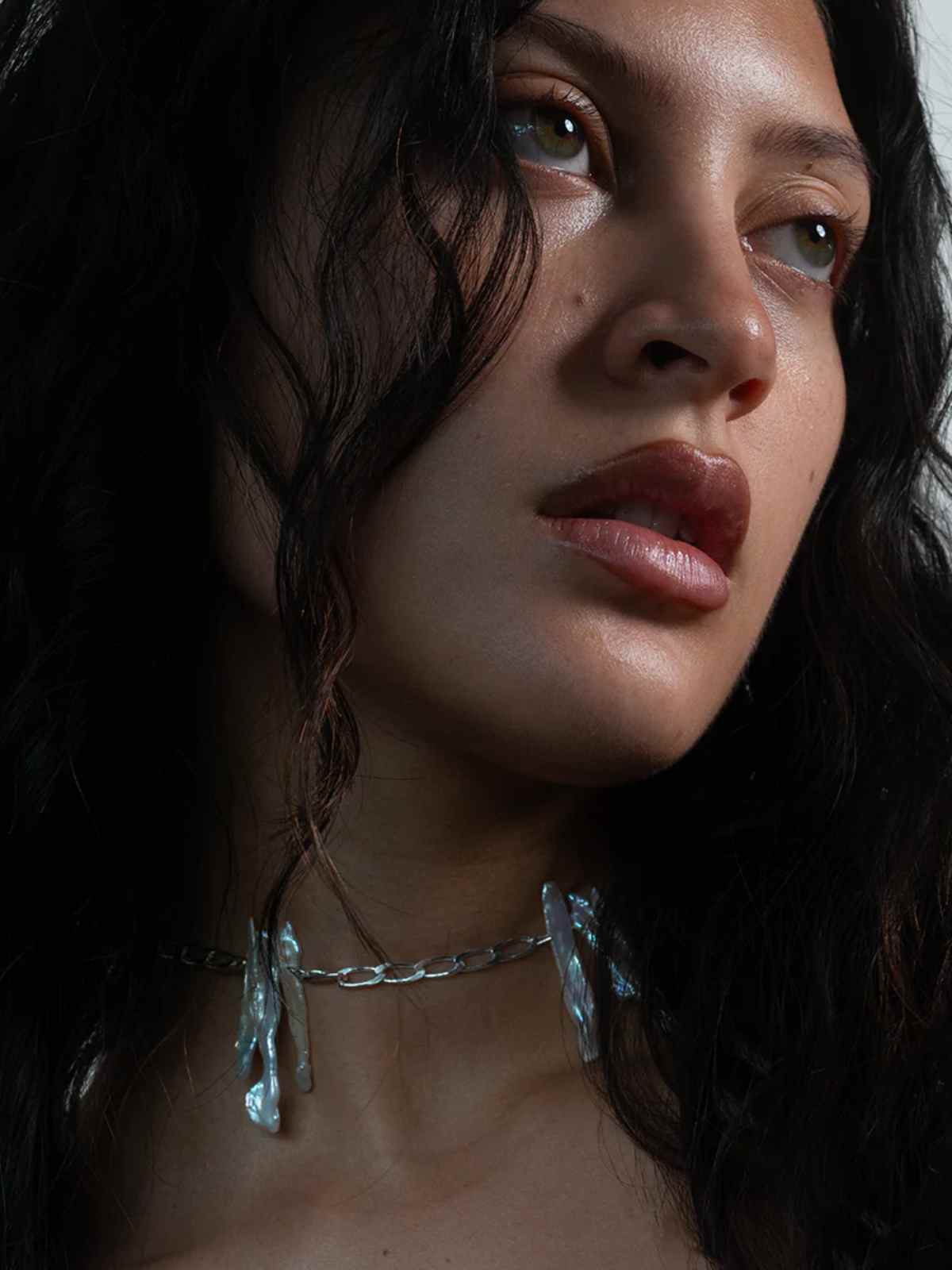 person wearing more sustainable jewellery from serprent and the swan