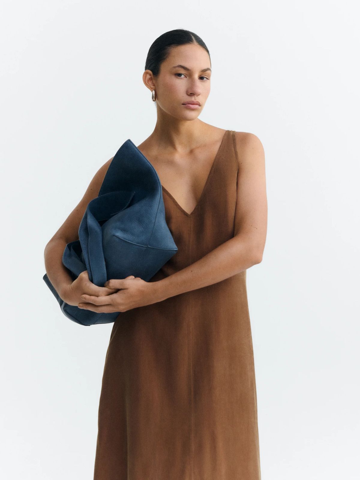 person wearing outfit from more sustainable european brand thinking mu