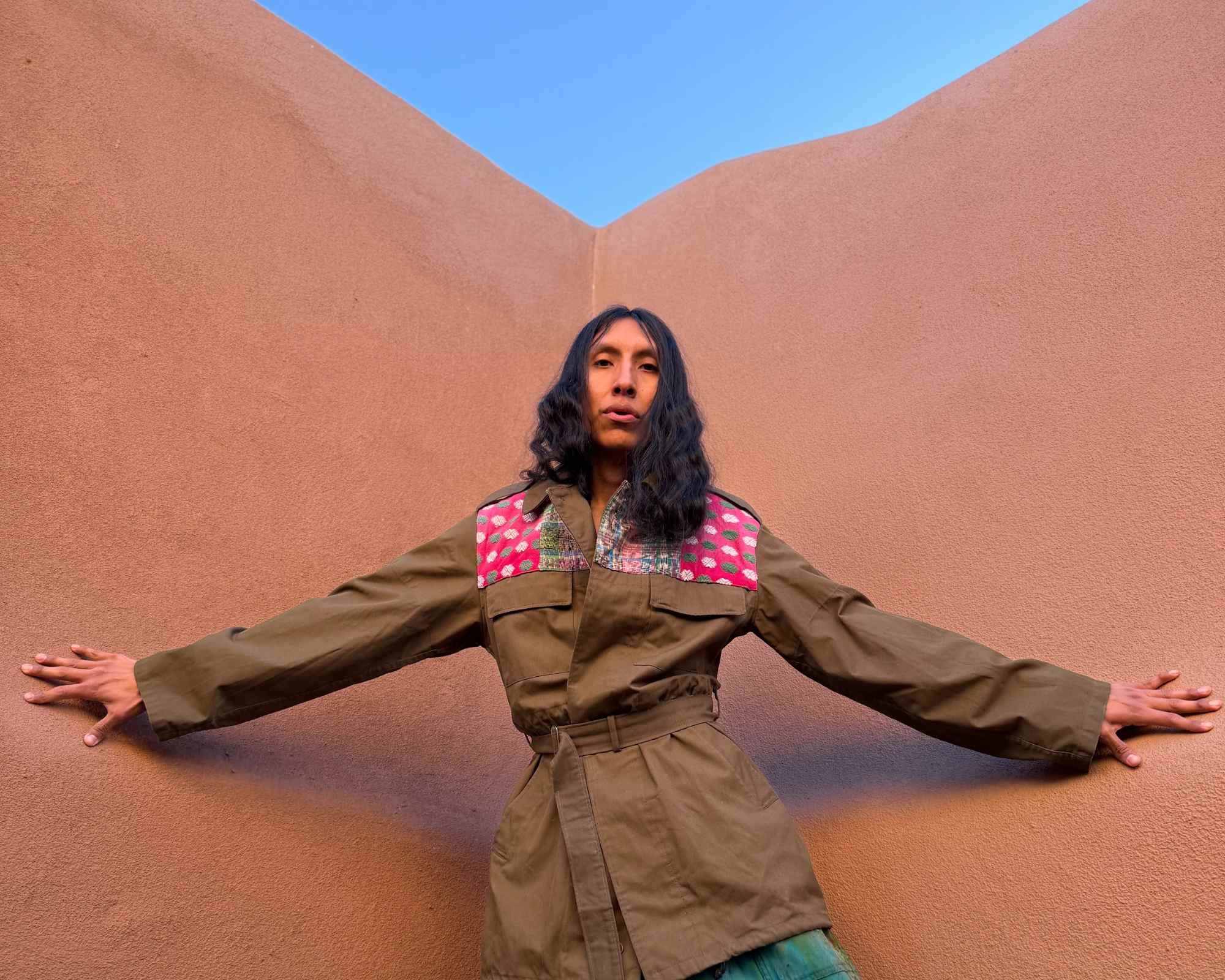 person wearing upcycled garments from sustainable indigenous fashion brand 4kinship