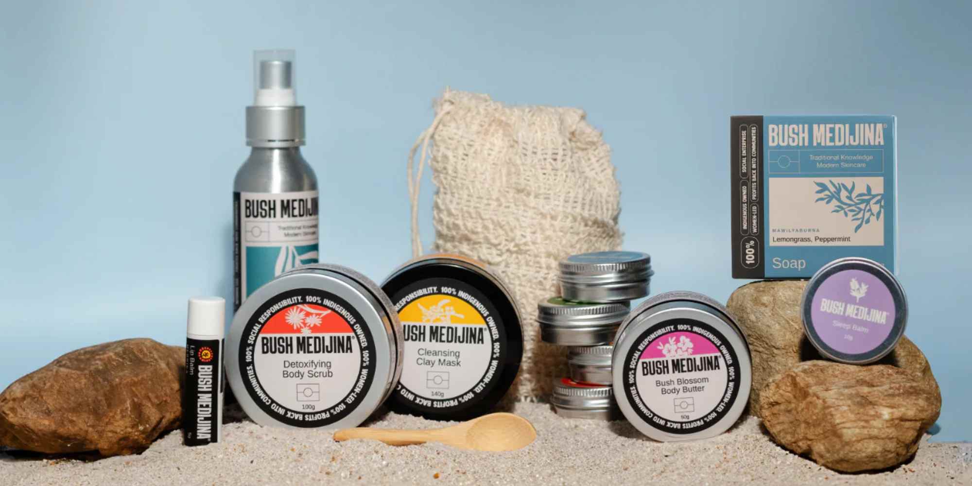 still life showing products from bush medijina in the sand