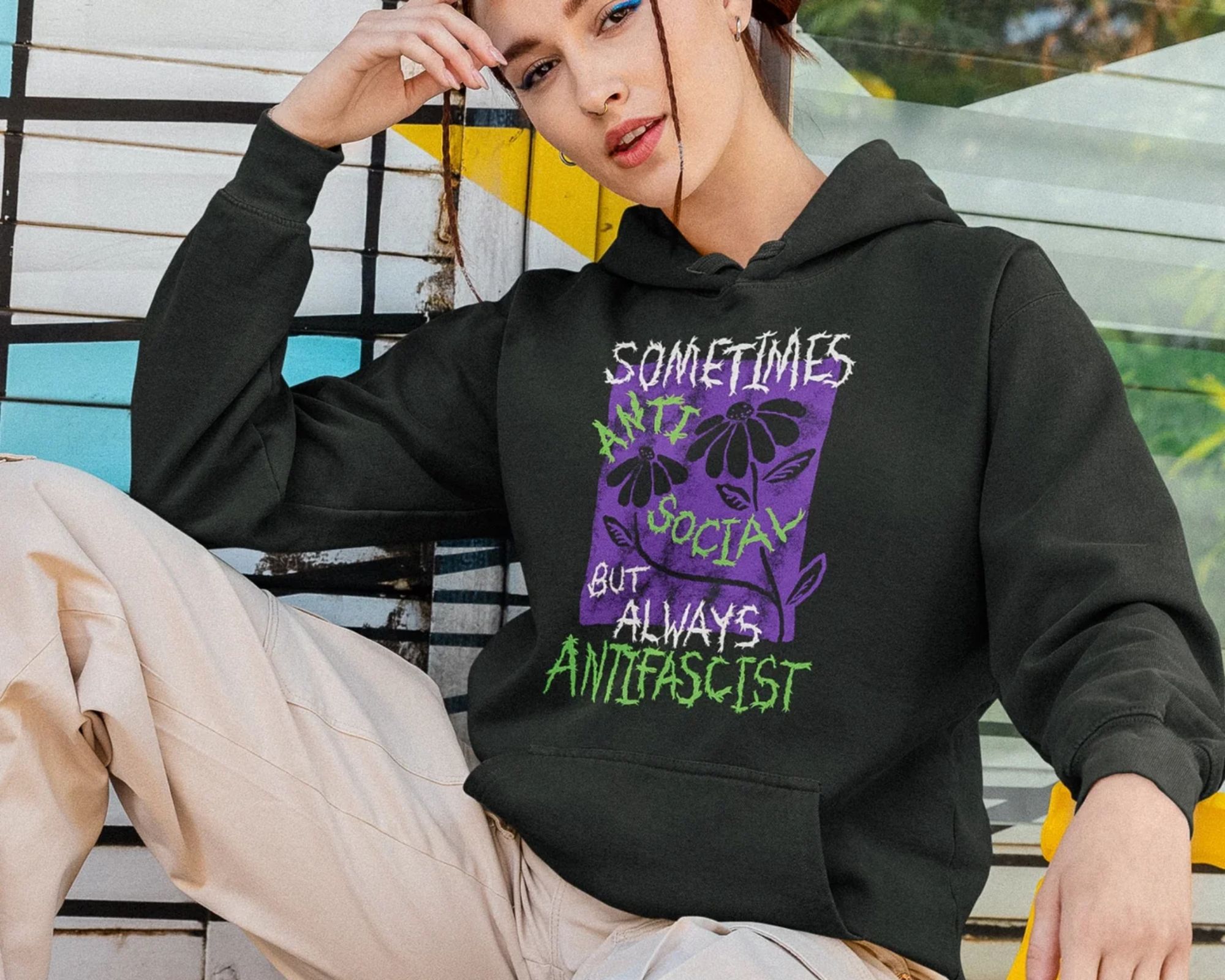 person wearing vegan hoodie from lonely kids club
