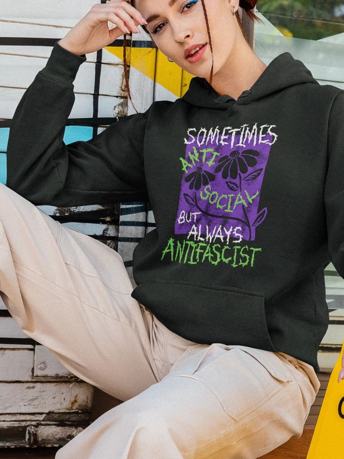 person wearing vegan hoodie from lonely kids club